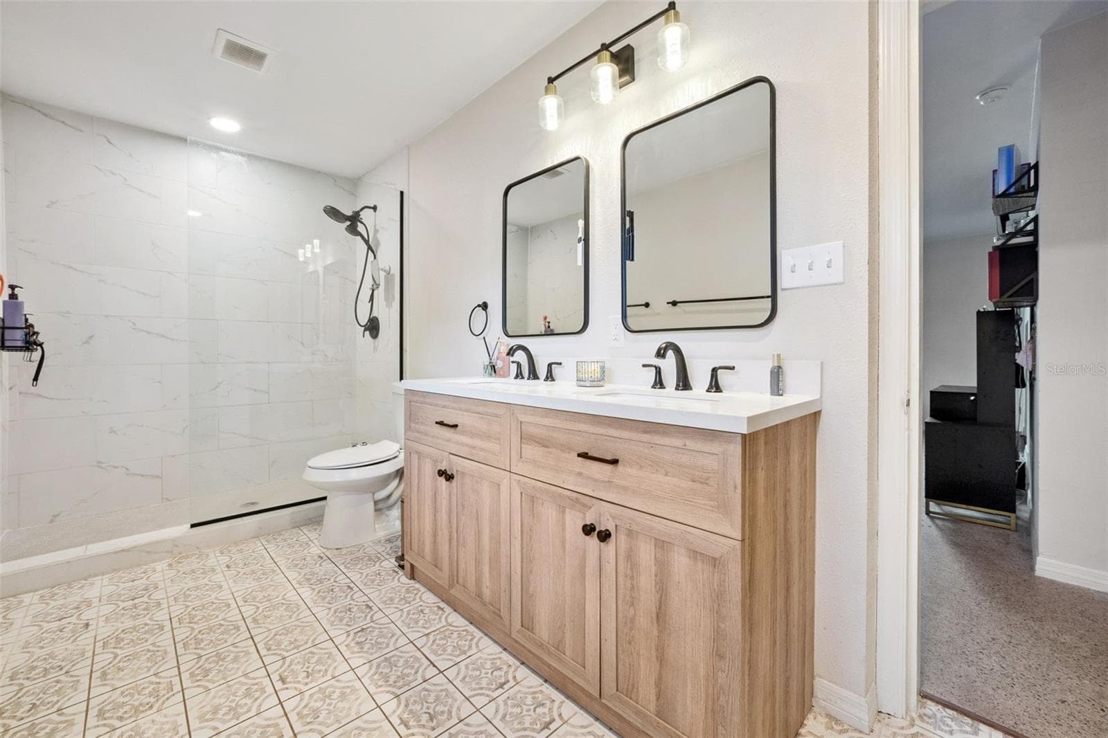 Primary with double vanities! - 219 S CRYSTAL DR, SANFORD
