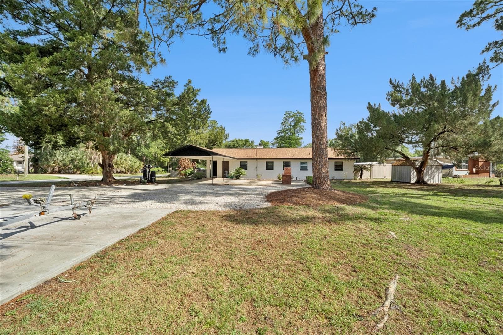 Large driveway to carport - 219 S CRYSTAL DR, SANFORD