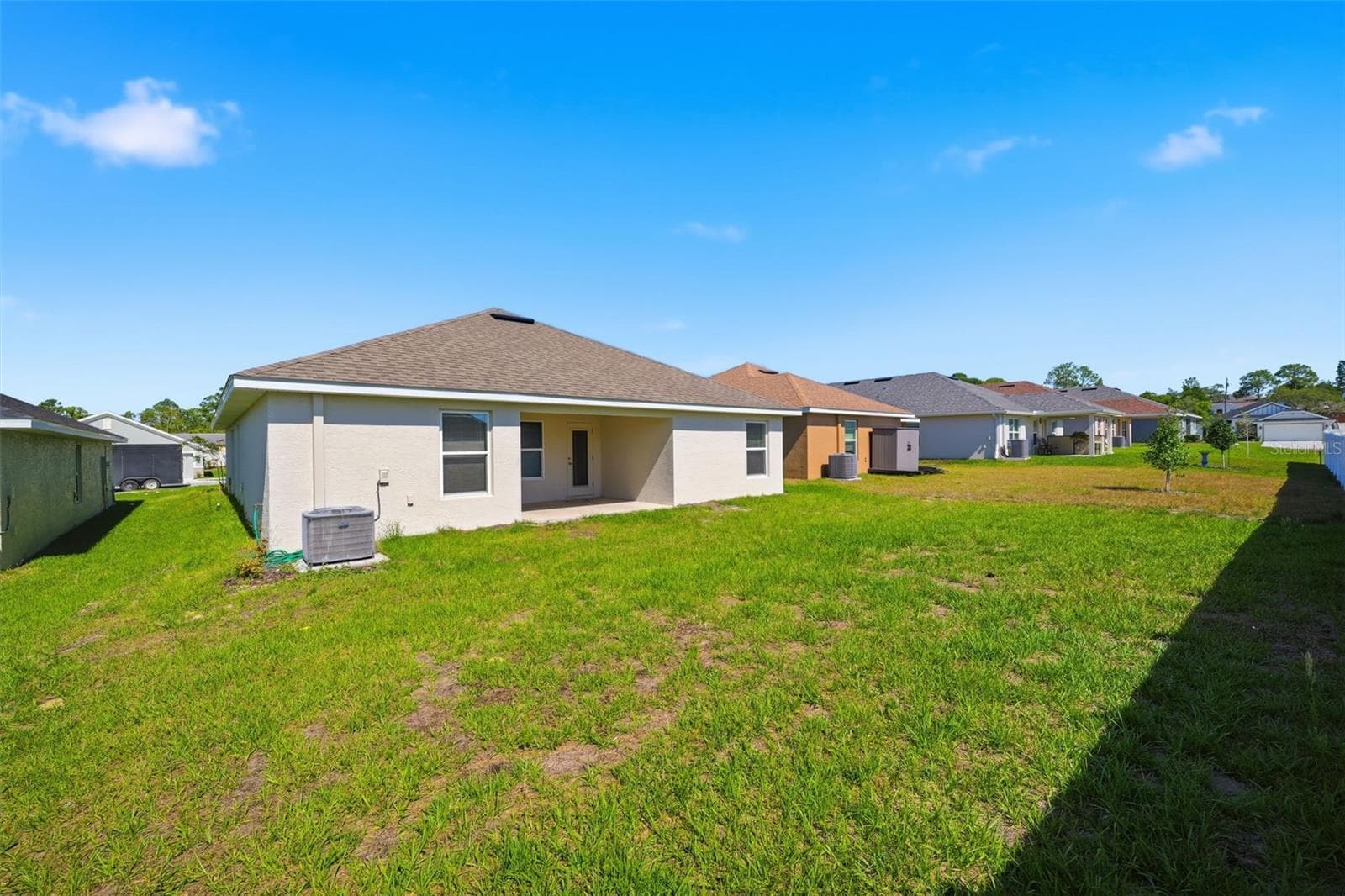 Rear Exterior - 5524 OCEAN BREEZE DR, SPRING HILL