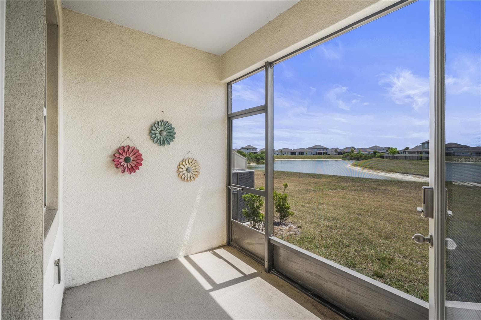 Screened lanai with pond views! - 11240 CAY SPRUCE WAY, SAN ANTONIO