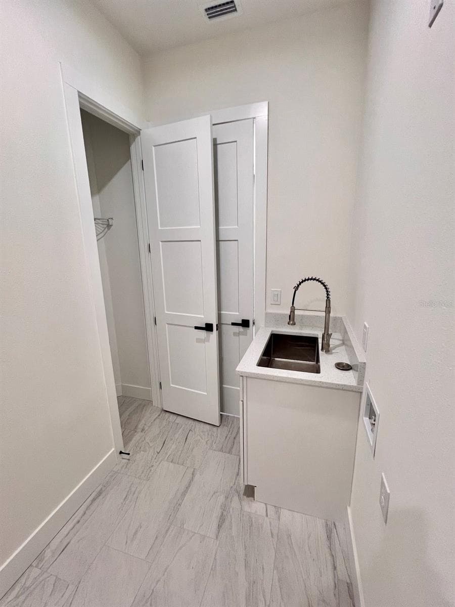 Laundry Closet - 9245 BOCA GRANDE AVE, ENGLEWOOD