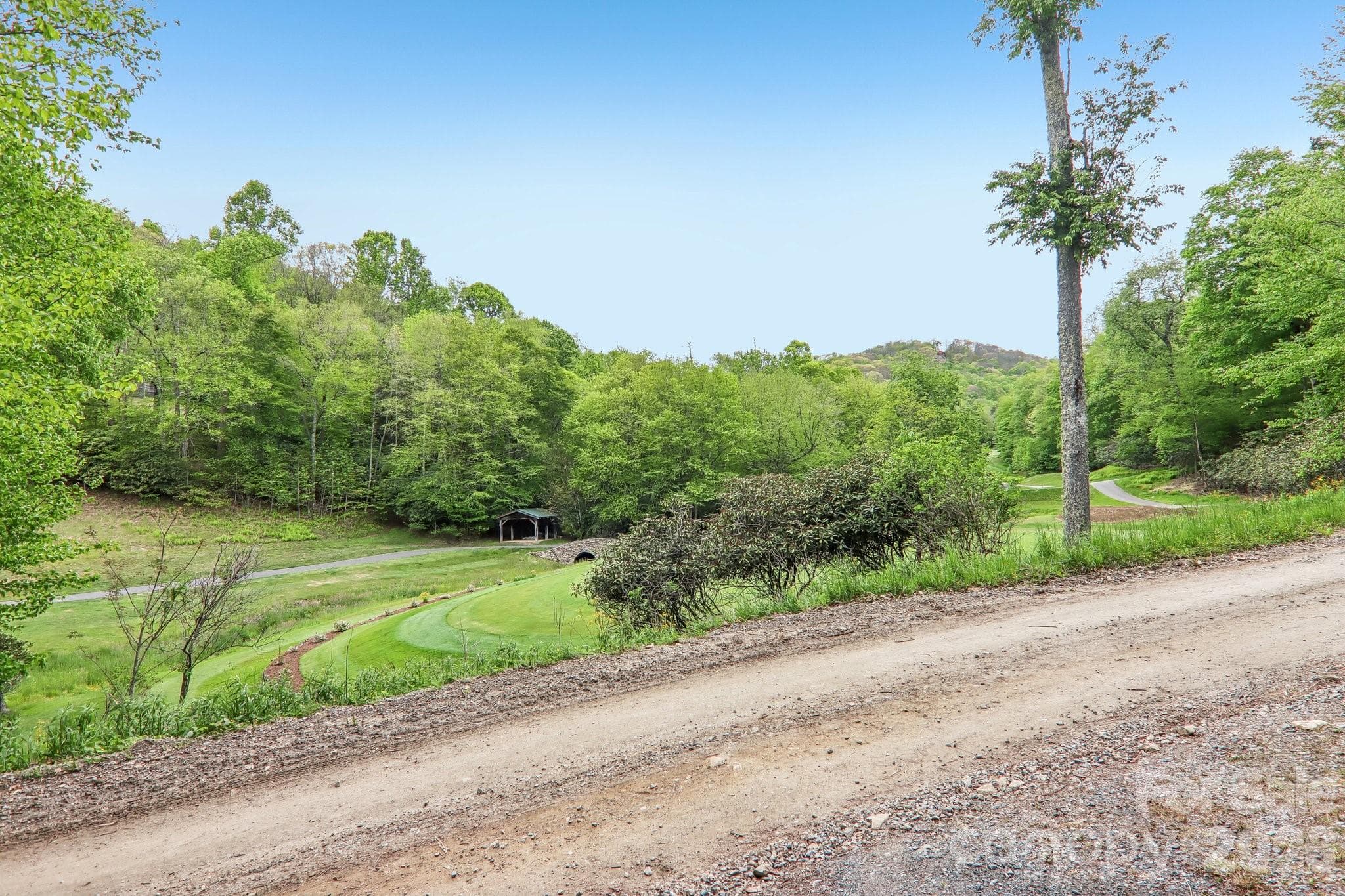 Views of the golf course from you front porch. - Mars Hill