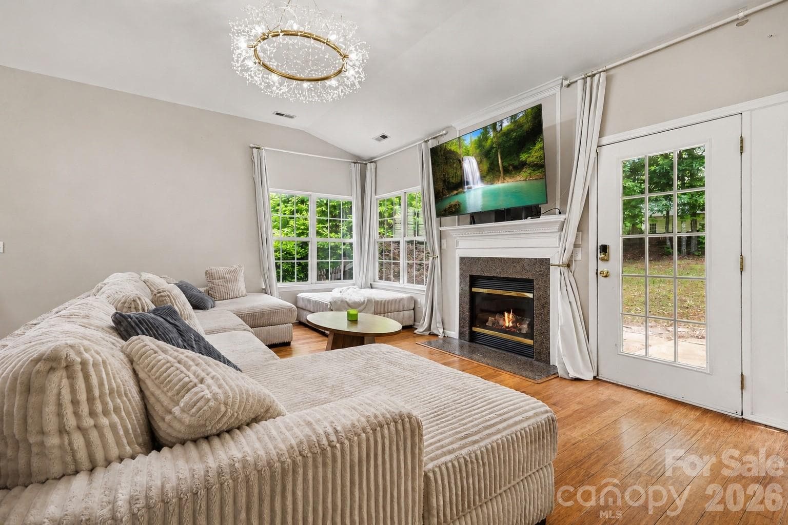Family room with French door access to the patio - Charlotte
