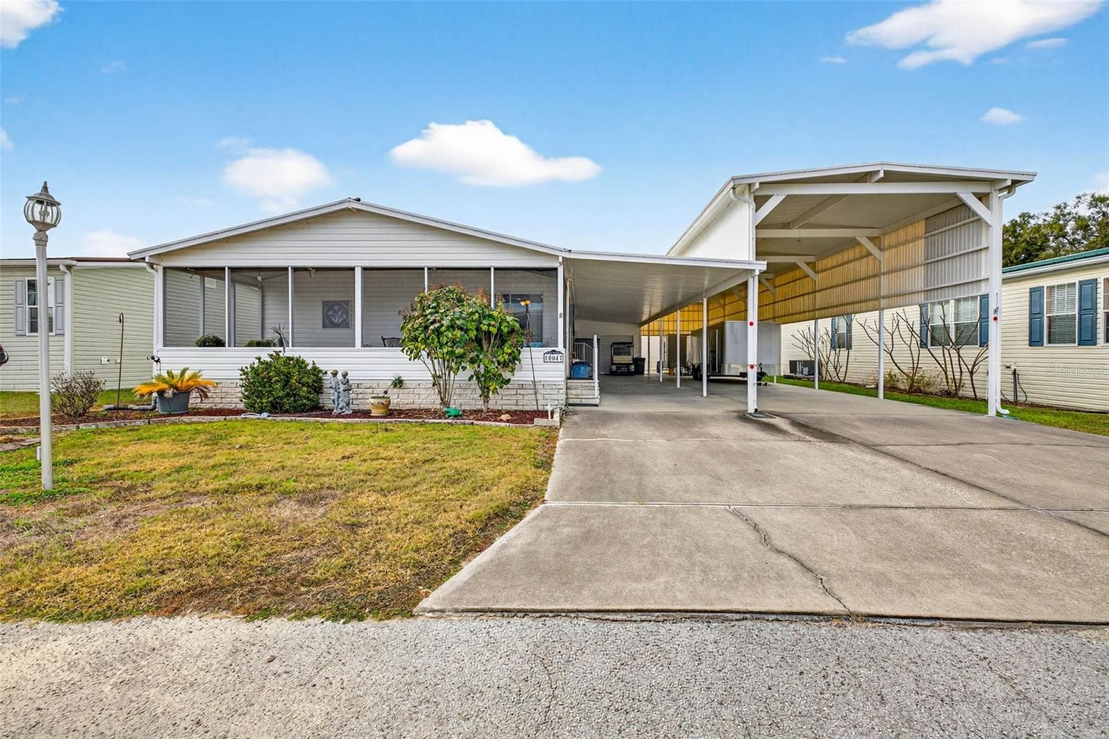 Manufactured Home at 10047 EQUITY AVE, DADE CITY, photo 2 of 35