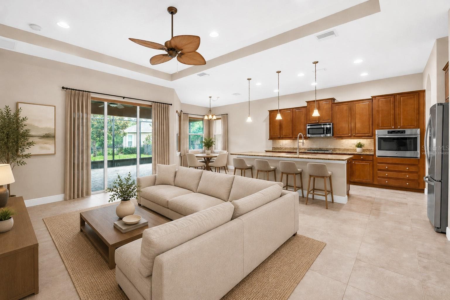 VIRTUALLY STAGED LIVING ROOM / KITCHEN / DINING - 903 VICTORIA HILLS DR S, DELAND