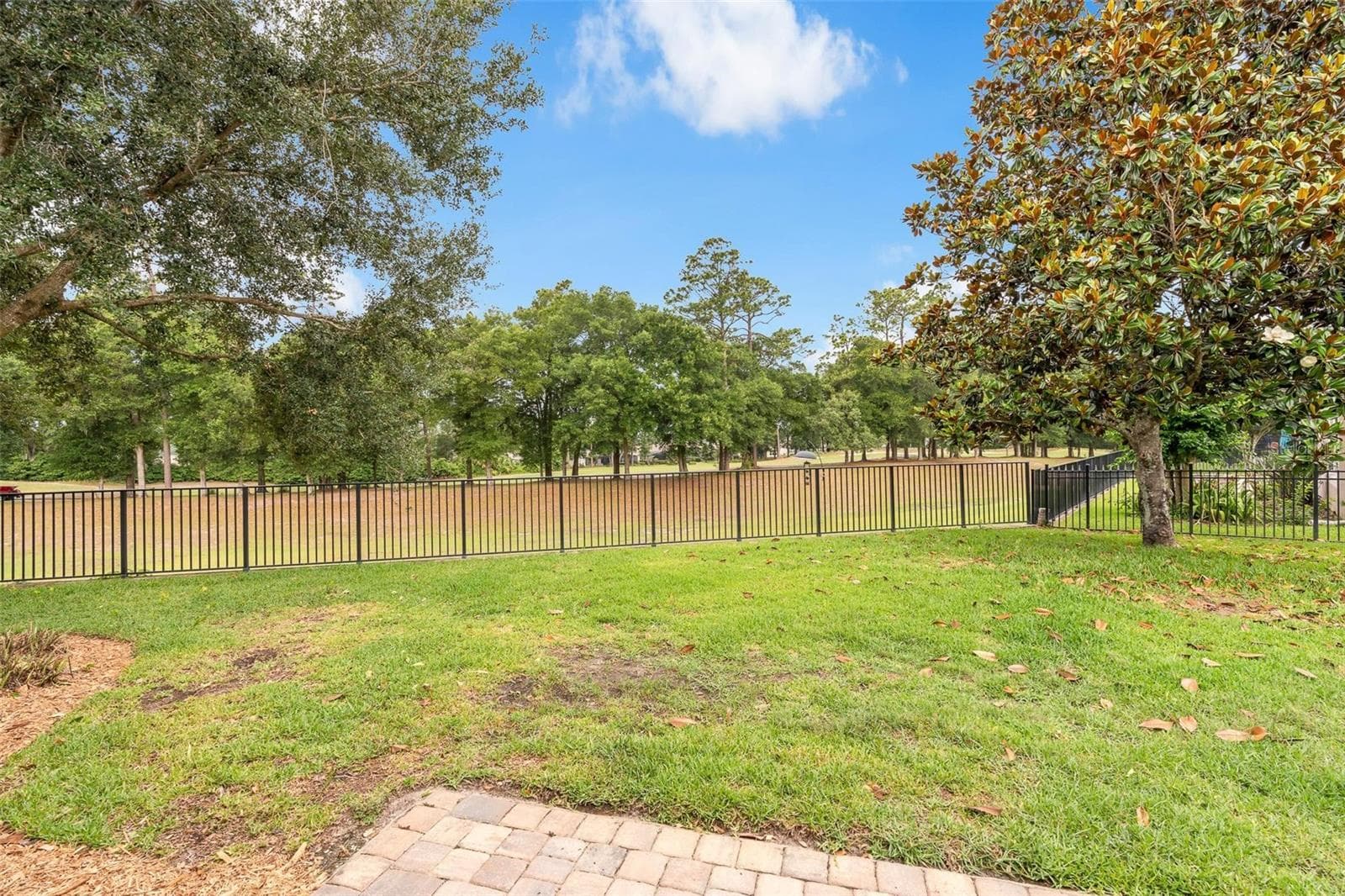FENCED IN YARD WITH GOLF COURSE VIEWS - 903 VICTORIA HILLS DR S, DELAND