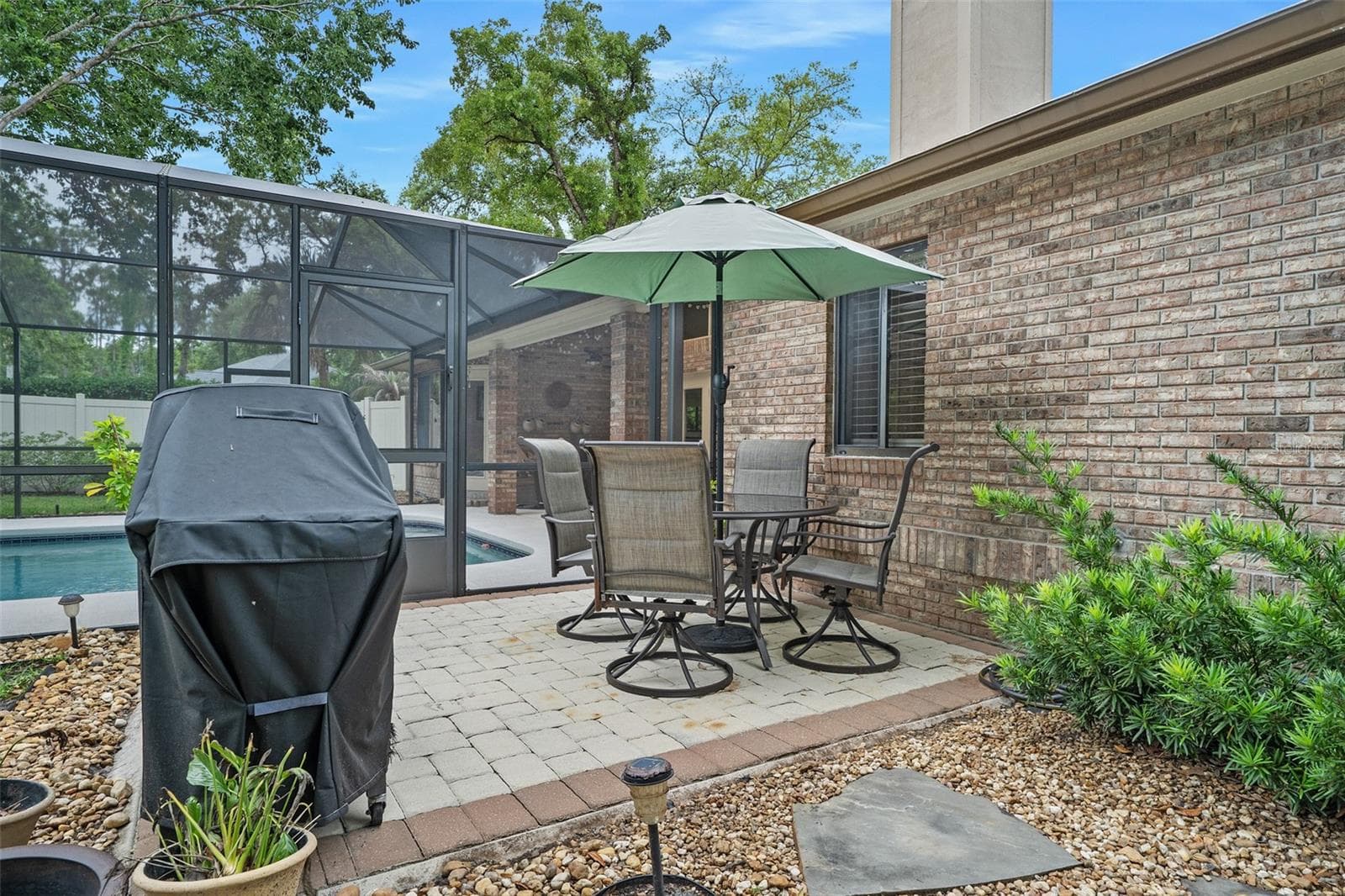 Side patio - 1 CROOKED BRIDGE WAY, ORMOND BEACH