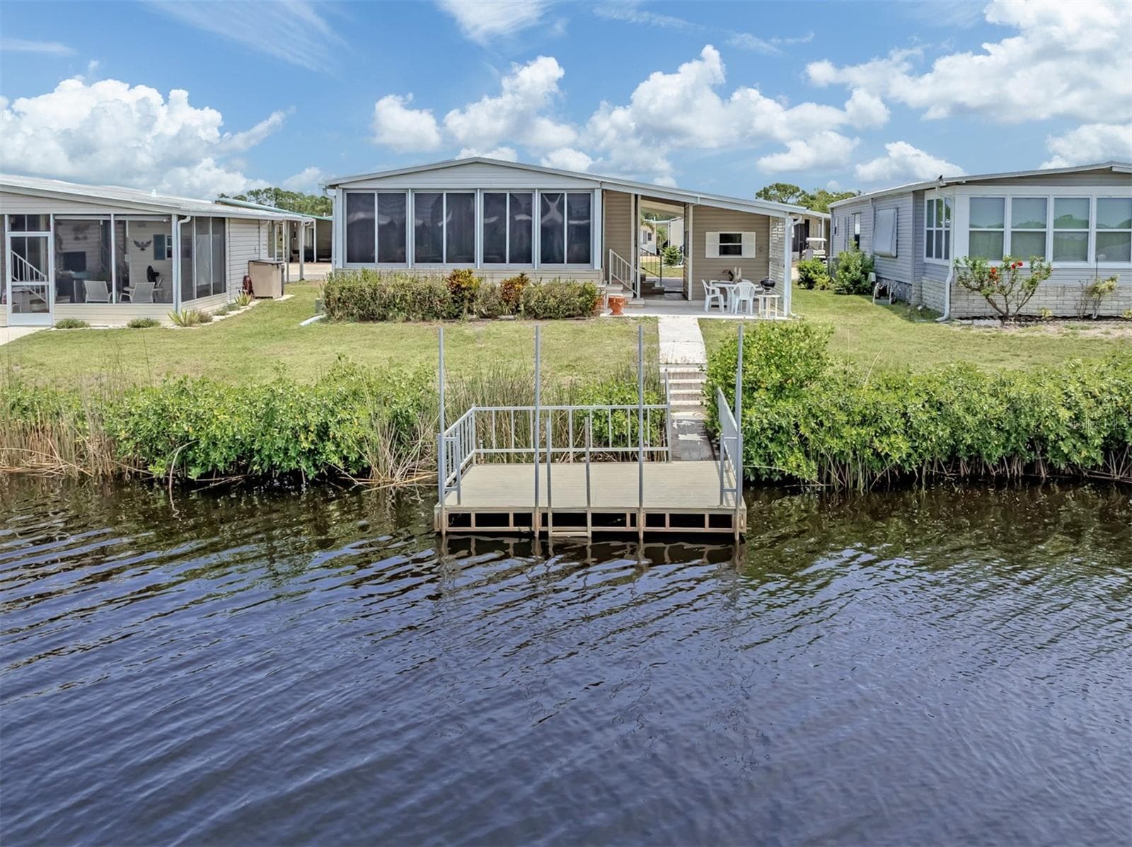 Dock, rear exterior - 132 MARTINIQUE RD, NORTH PORT