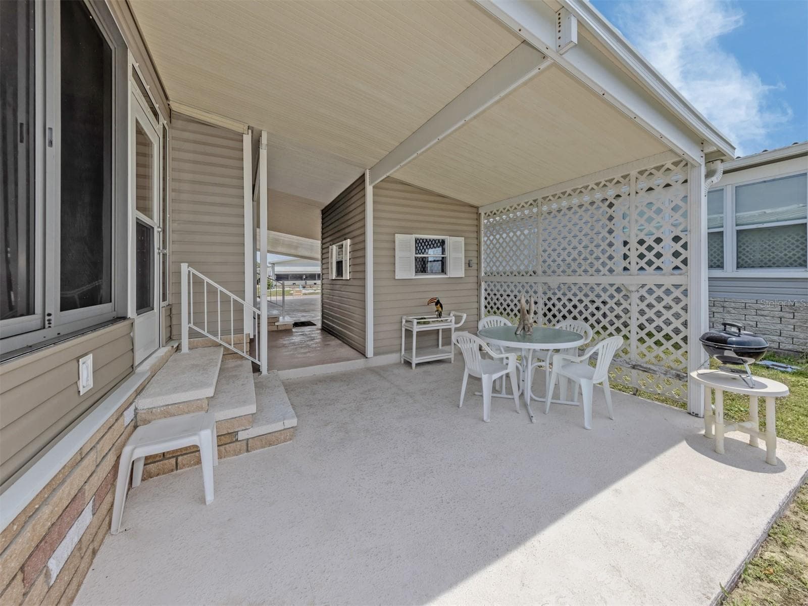 Covered patio - 132 MARTINIQUE RD, NORTH PORT