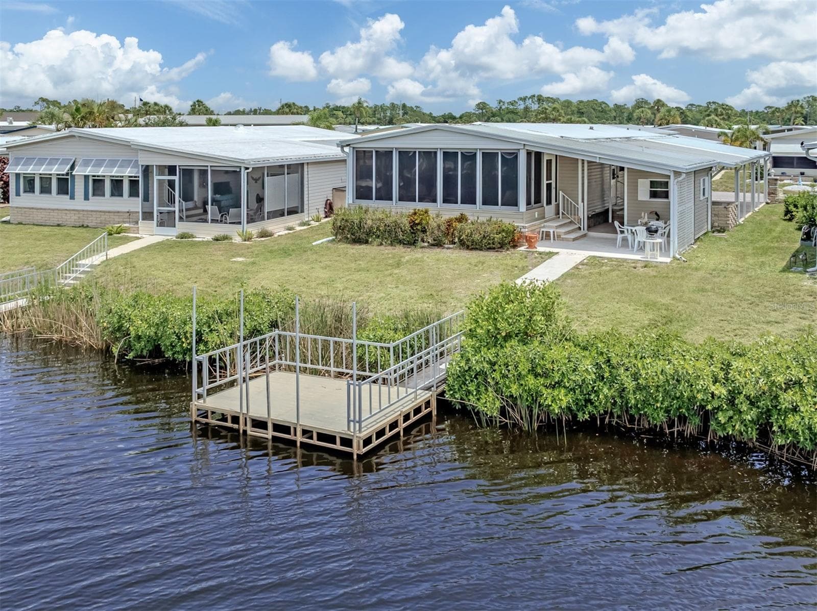 Dock, rear exterior - 132 MARTINIQUE RD, NORTH PORT