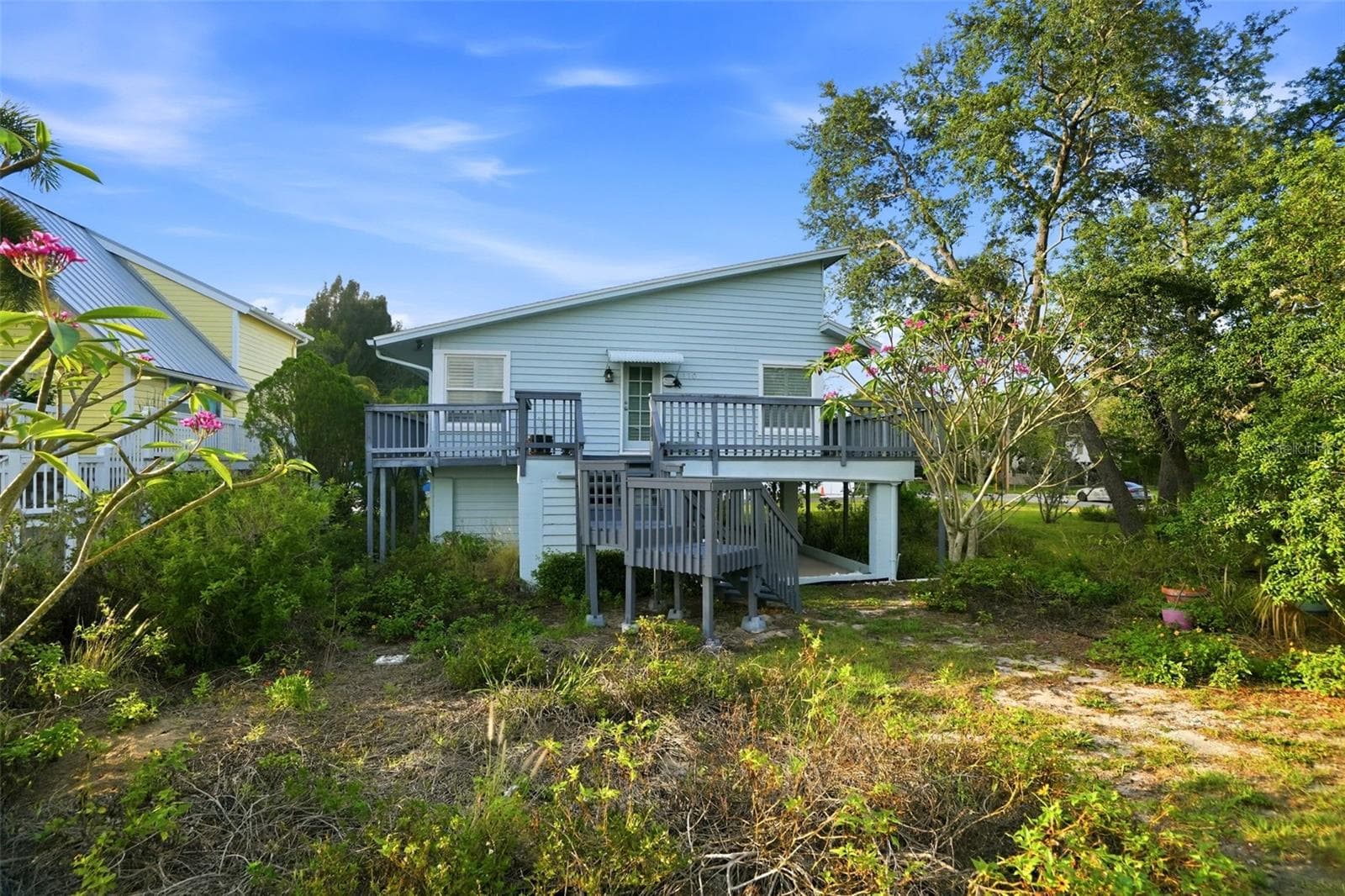 Natural landscaping around the home. - 110 GEORGIA AVE. AVE, CRYSTAL BEACH