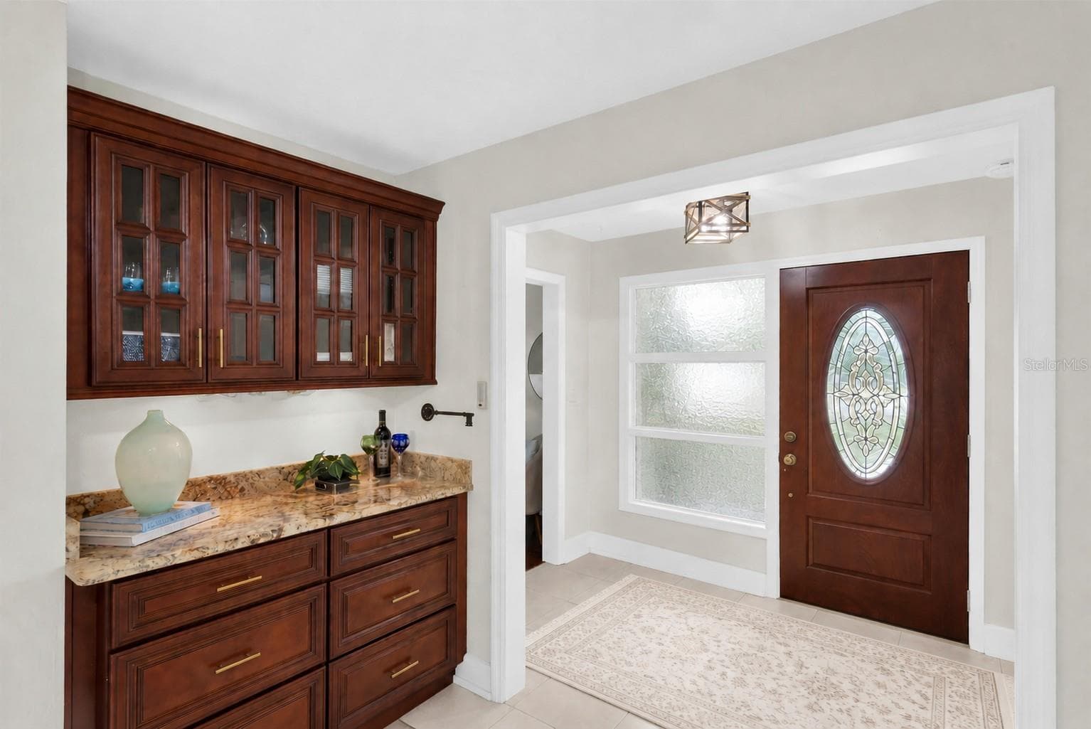 Family room with sophisticated dry bar and illuminated cabinetry - 6212 20TH ST S, ST PETERSBURG