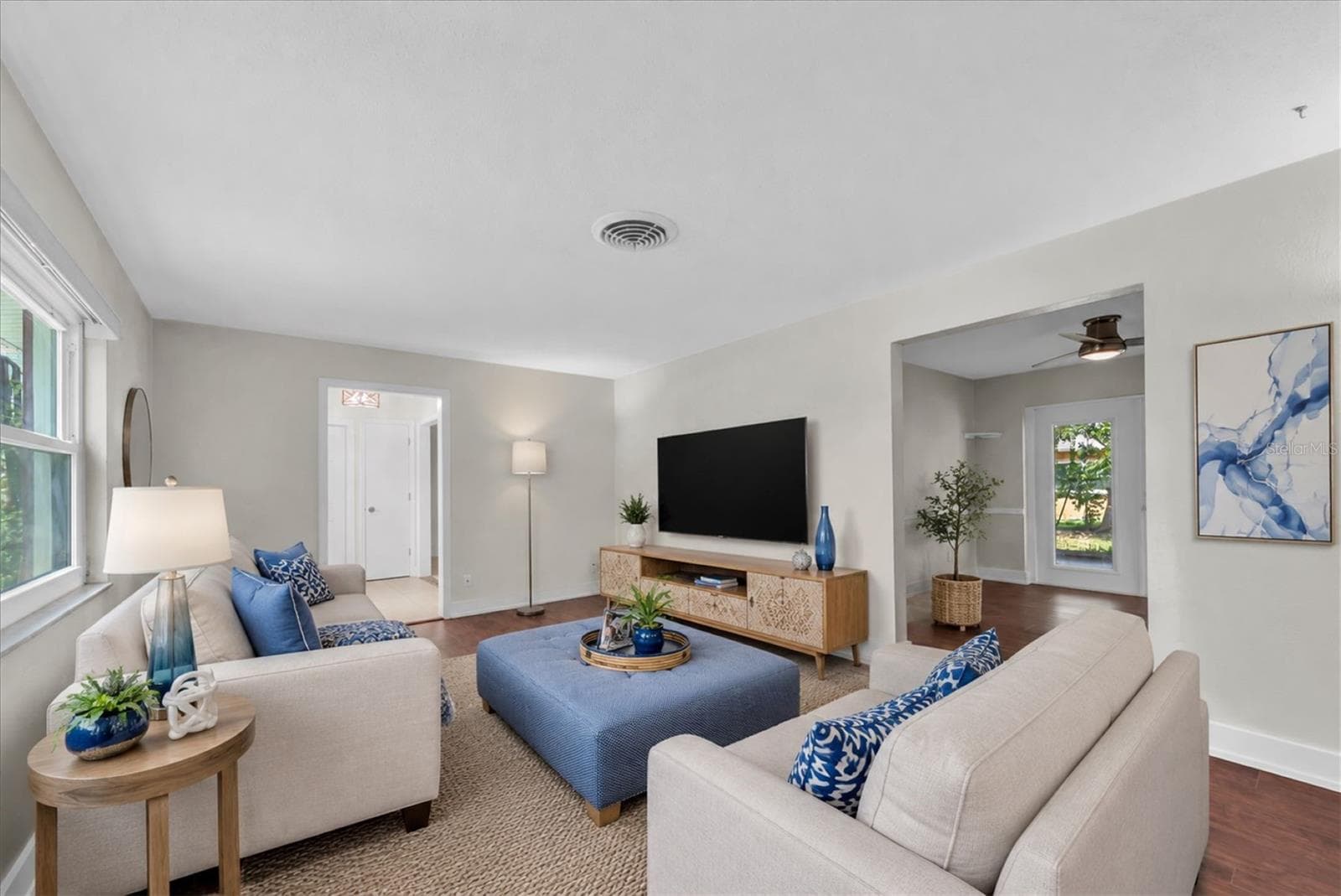 Spacious living room filled with natural light and flexible seating areas - 6212 20TH ST S, ST PETERSBURG