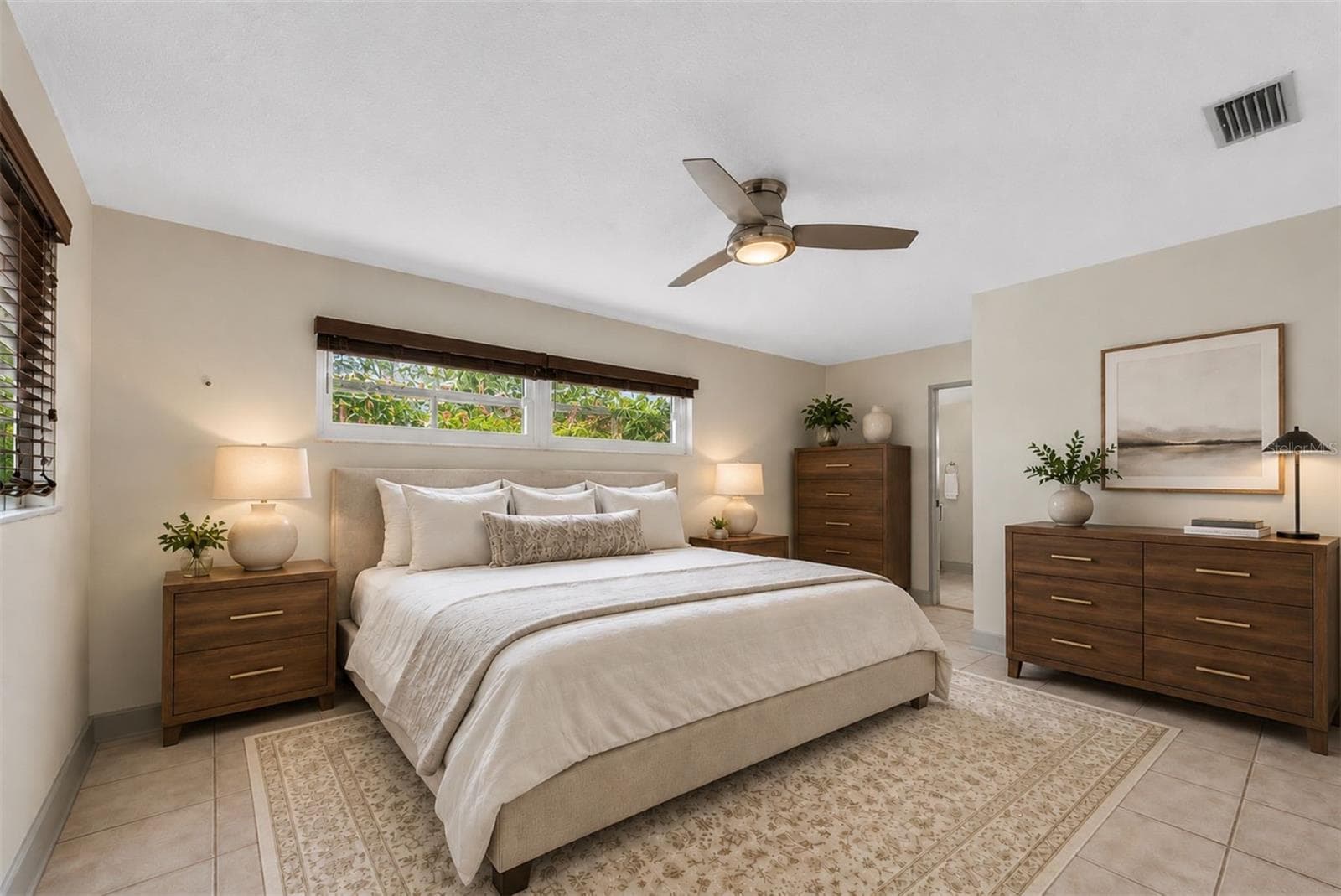 Private primary suite with walk-in closet and updated en-suite bath - 6212 20TH ST S, ST PETERSBURG