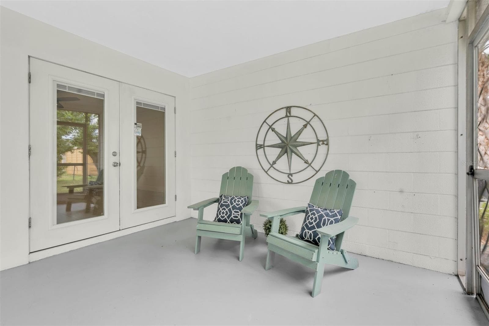 Spacious screened patio with plenty of room for grilling and outdoor dining - 6212 20TH ST S, ST PETERSBURG