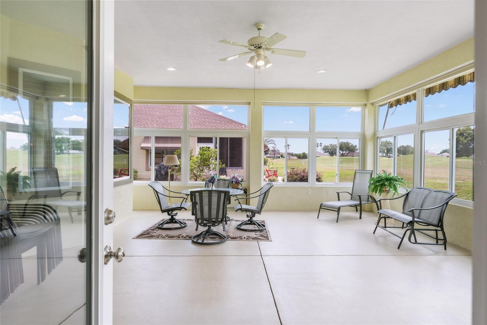 lanai staged - 13500 SE 97TH TERRACE RD, SUMMERFIELD