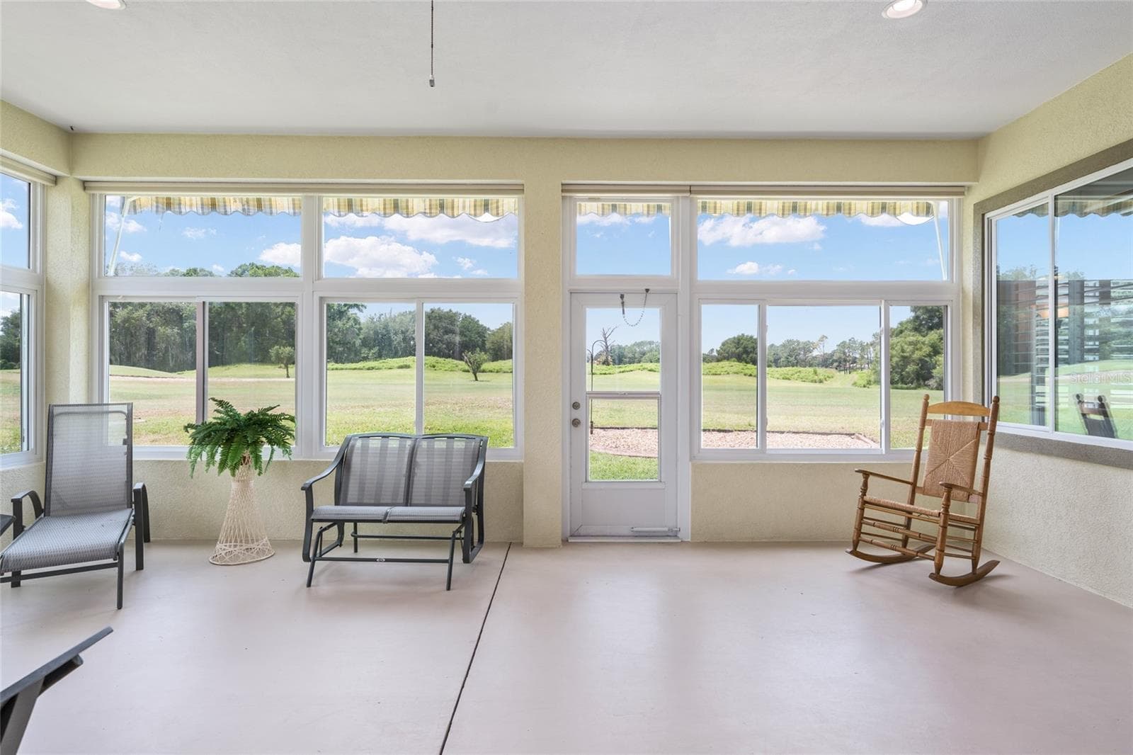 lanai staged - 13500 SE 97TH TERRACE RD, SUMMERFIELD