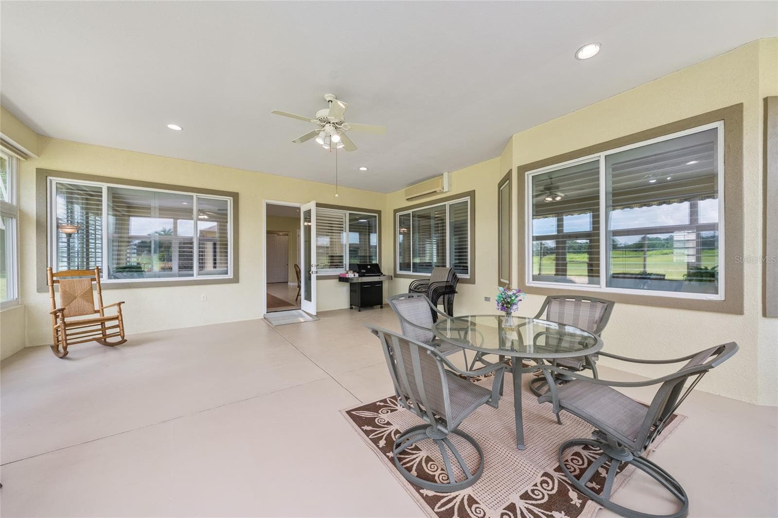 lanai staged - 13500 SE 97TH TERRACE RD, SUMMERFIELD