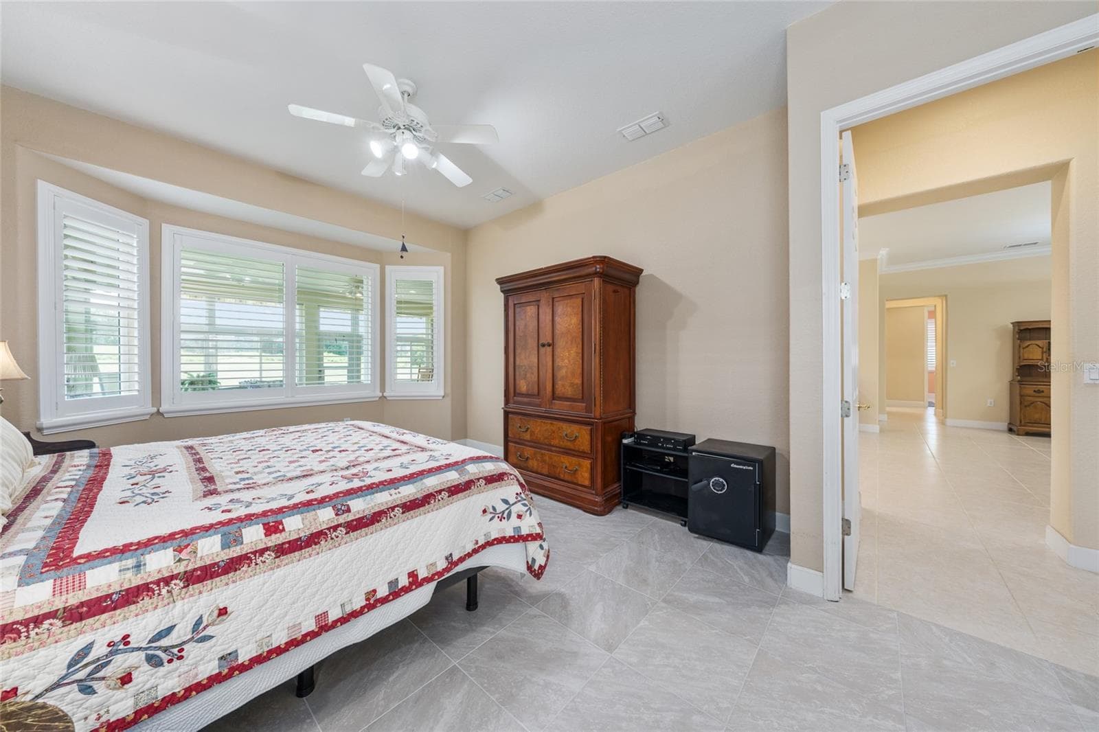 primary bedroom staged - 13500 SE 97TH TERRACE RD, SUMMERFIELD