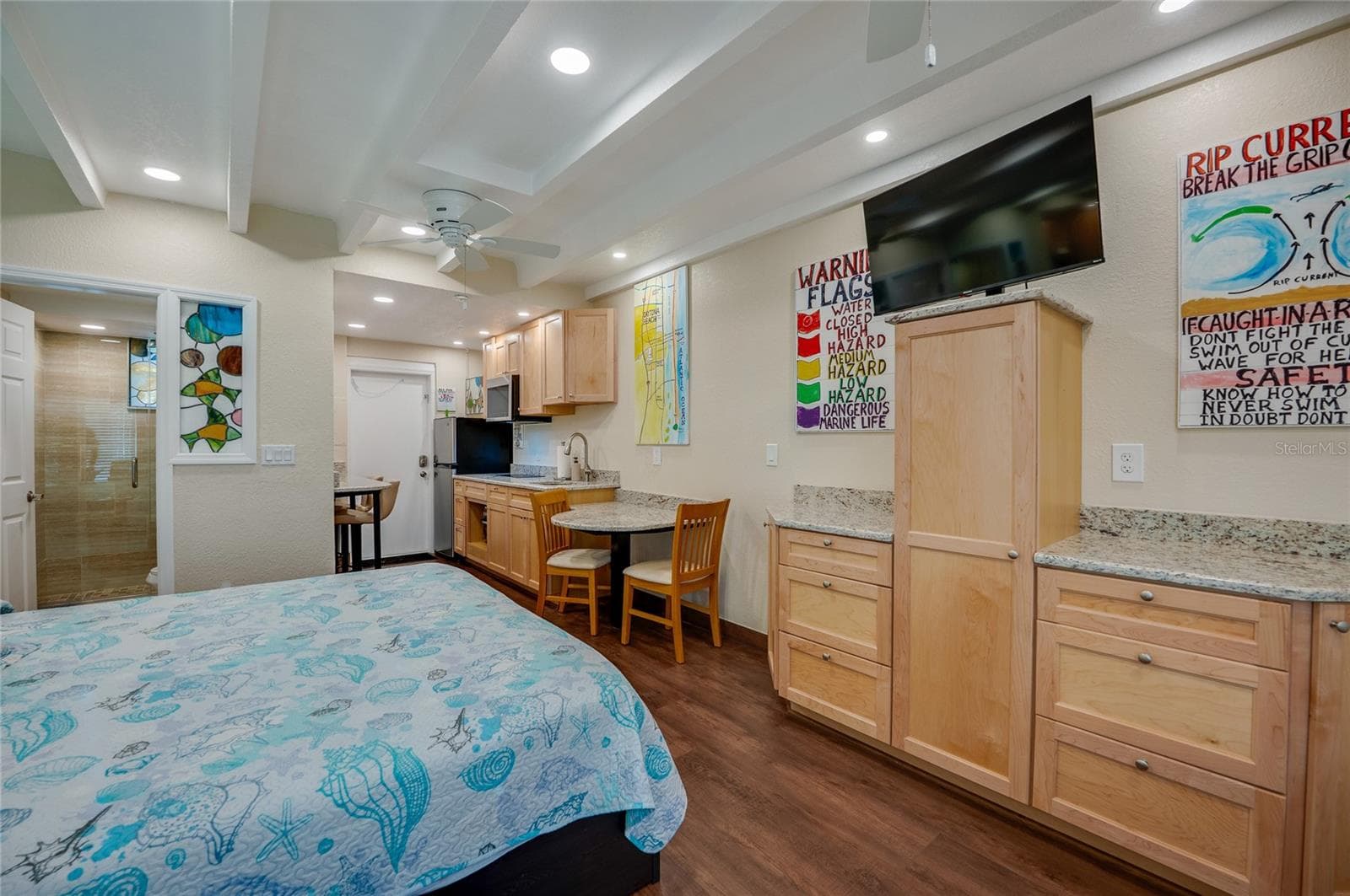 Bright dining nook situated just off the kitchen, offering a comfortable spot for morning coffee or a casual dinner for two. - 935 S ATLANTIC AVE #165, DAYTONA BEACH