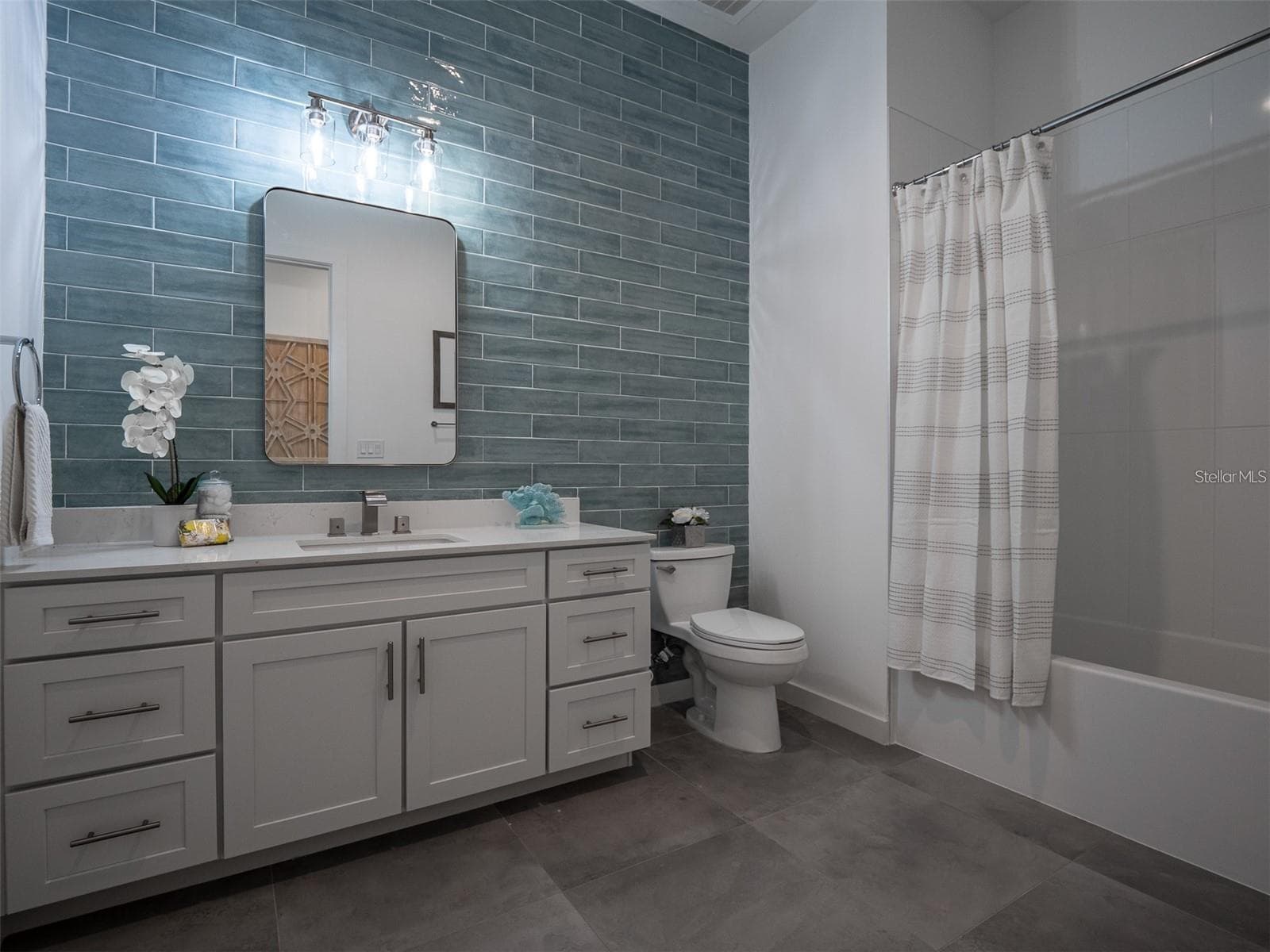 Hall Bathroom with tub and shower and double sinks - 920 N OSCEOLA AVE #801, CLEARWATER