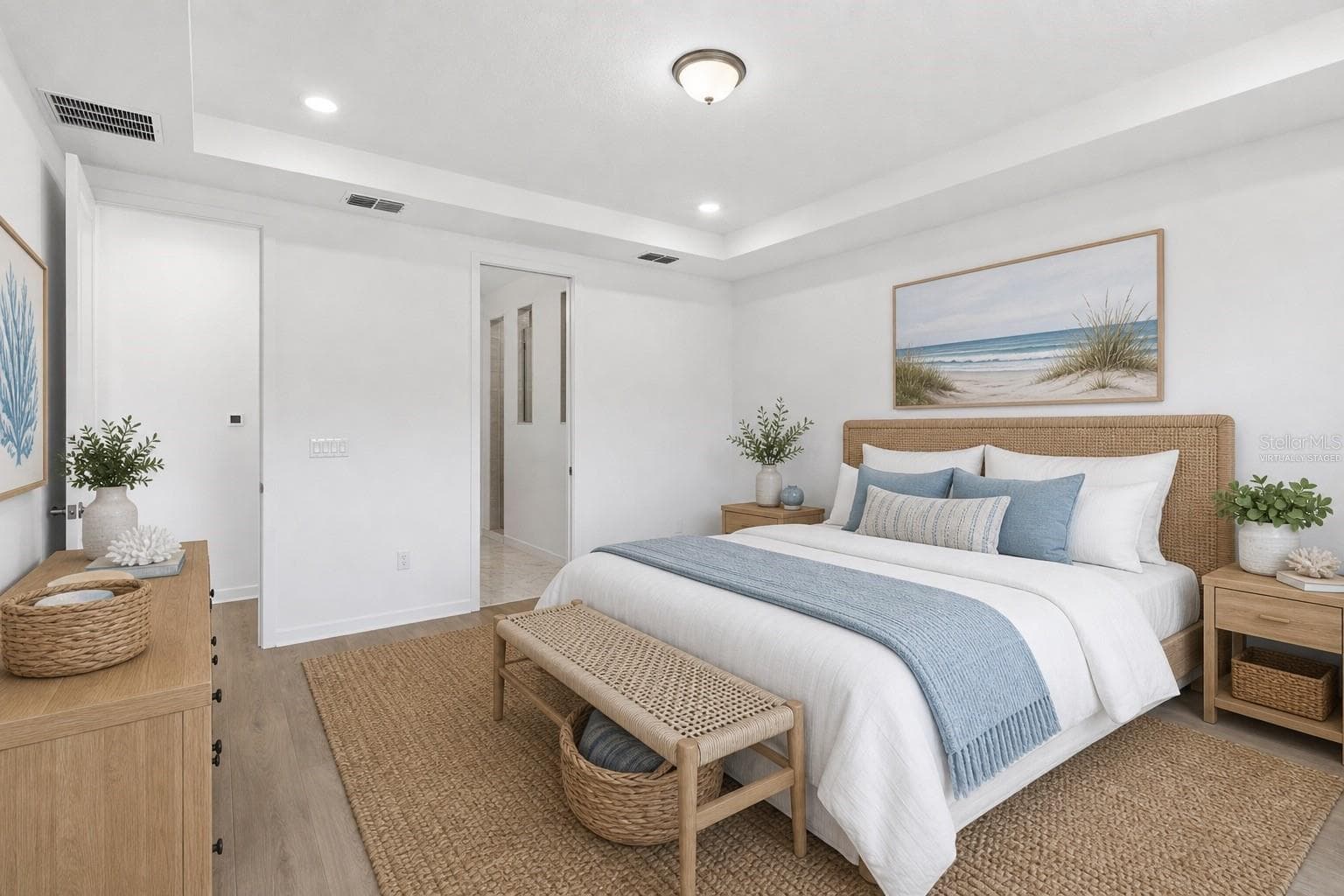 Virtually staged primary suite with soft natural light and a calm, comfortable feel. - 13824 SUNLIGHT MEADOW DR, RIVERVIEW