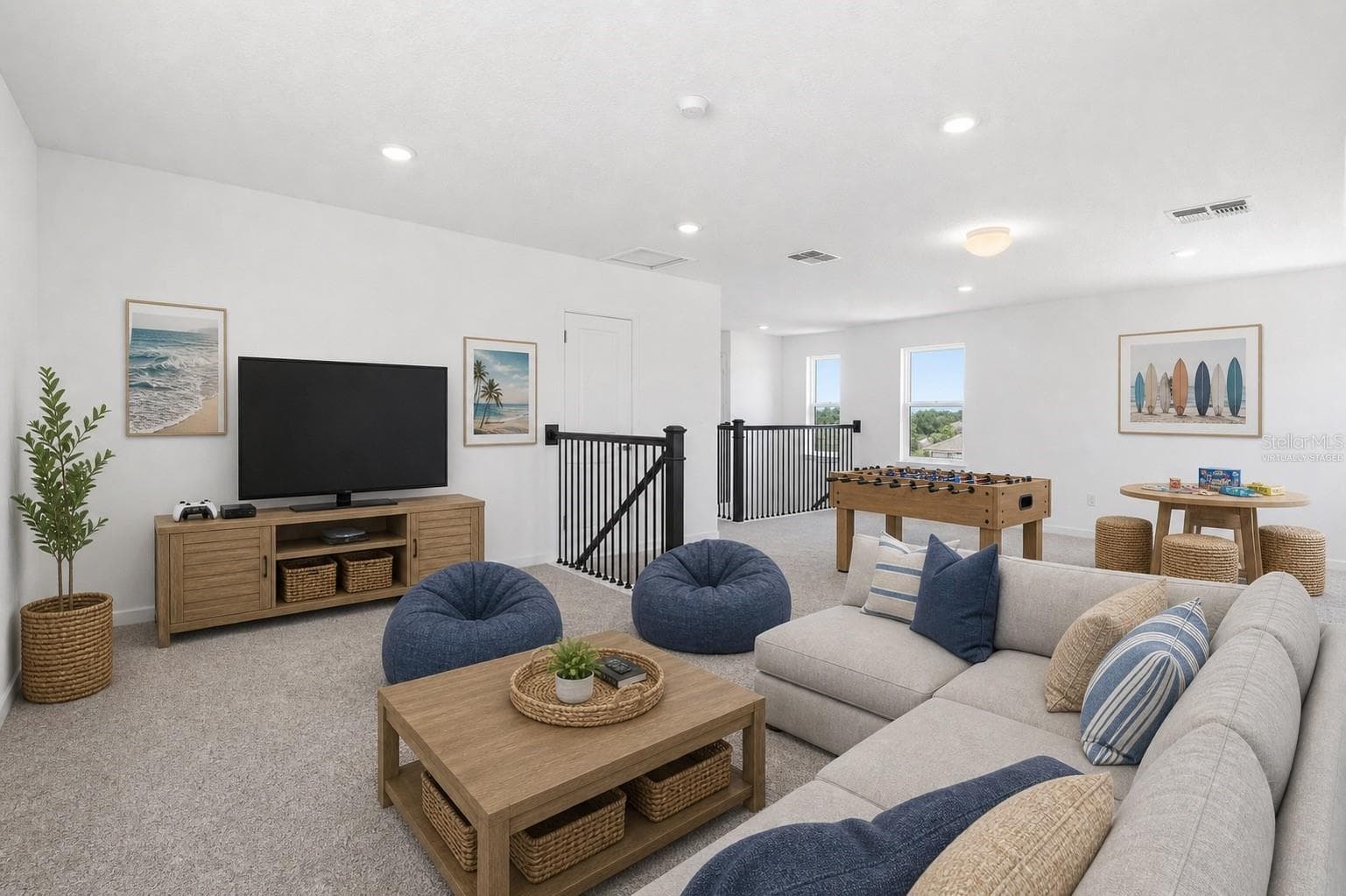 Virtually staged loft showing the perfect setup for movie nights, game days, and casual hangouts. - 13824 SUNLIGHT MEADOW DR, RIVERVIEW