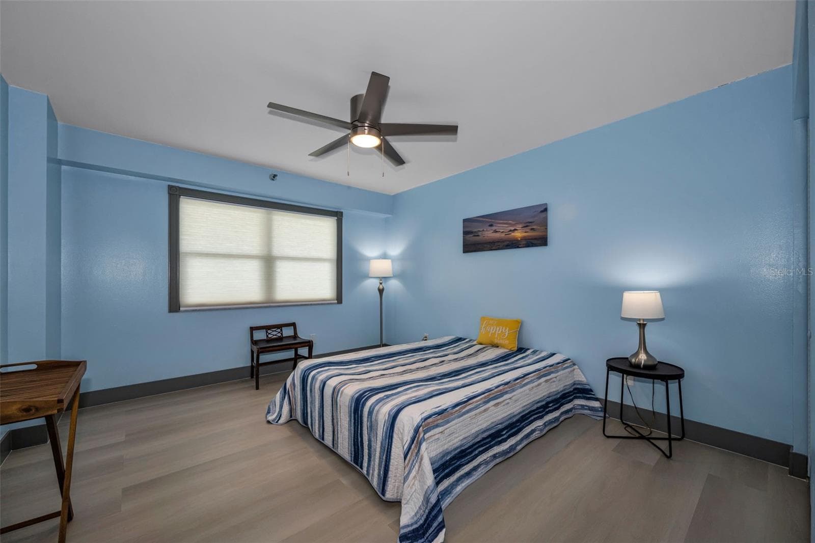 Second bedroom with new fan, luxury randow plank flooring. - 5400 PARK ST N #303, ST PETERSBURG