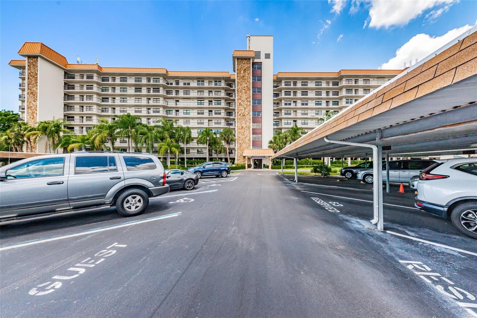 Otter Key parking, building, guest spots, and reserved spots. - 5400 PARK ST N #303, ST PETERSBURG