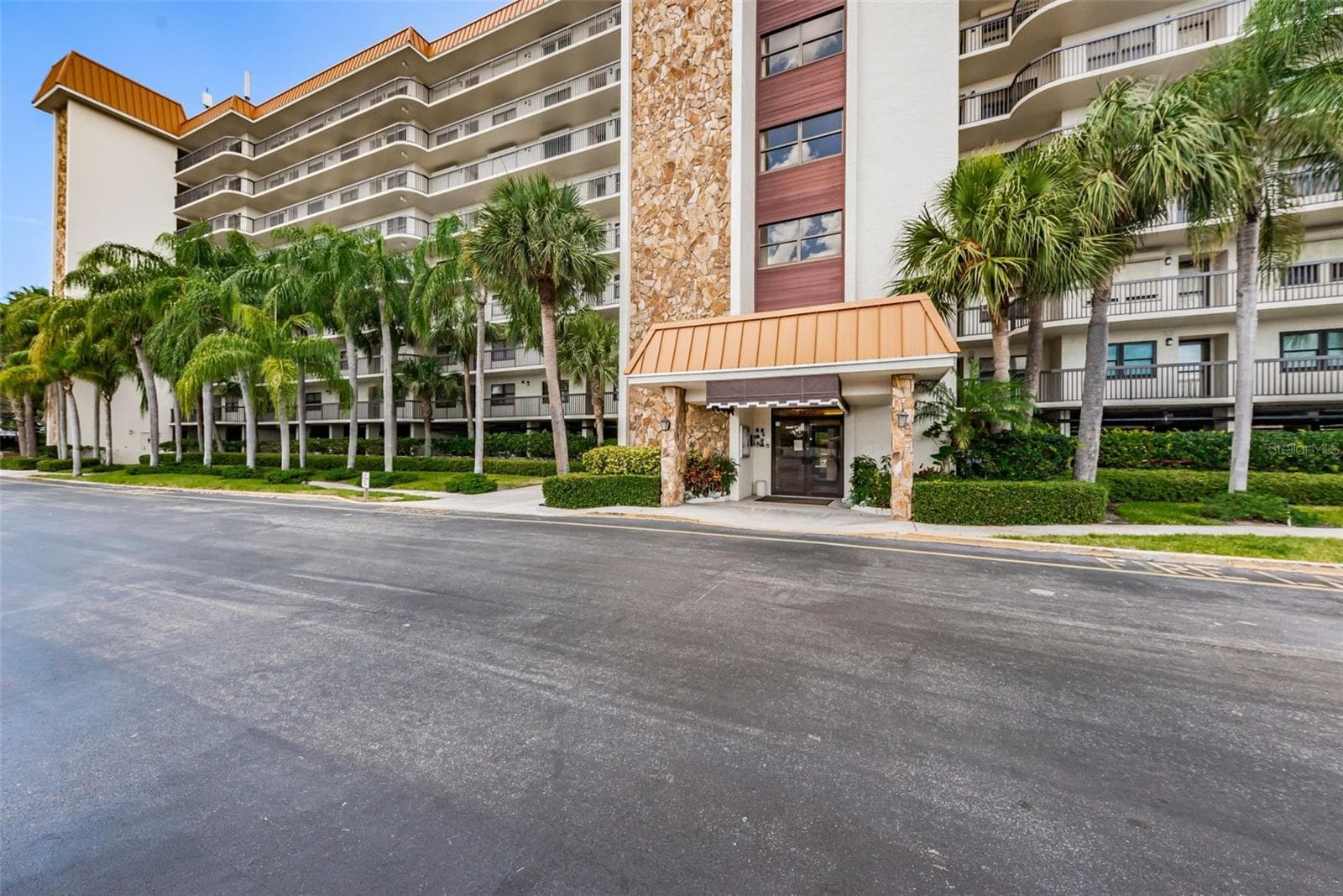 Main entrance with exceptional landscaping! - 5400 PARK ST N #303, ST PETERSBURG