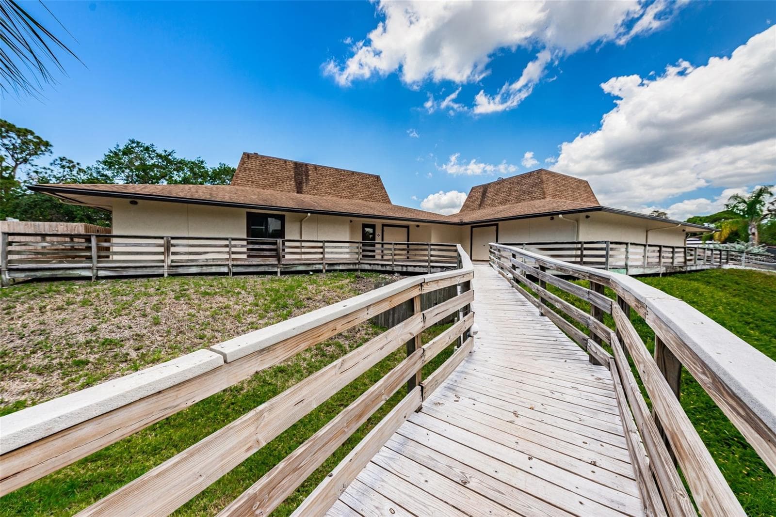 A scenic boardwalk along the Bayou takes you to the heated pool, the Association Clubhouse, the tennis courts and pickle ball courts. - 5400 PARK ST N #303, ST PETERSBURG