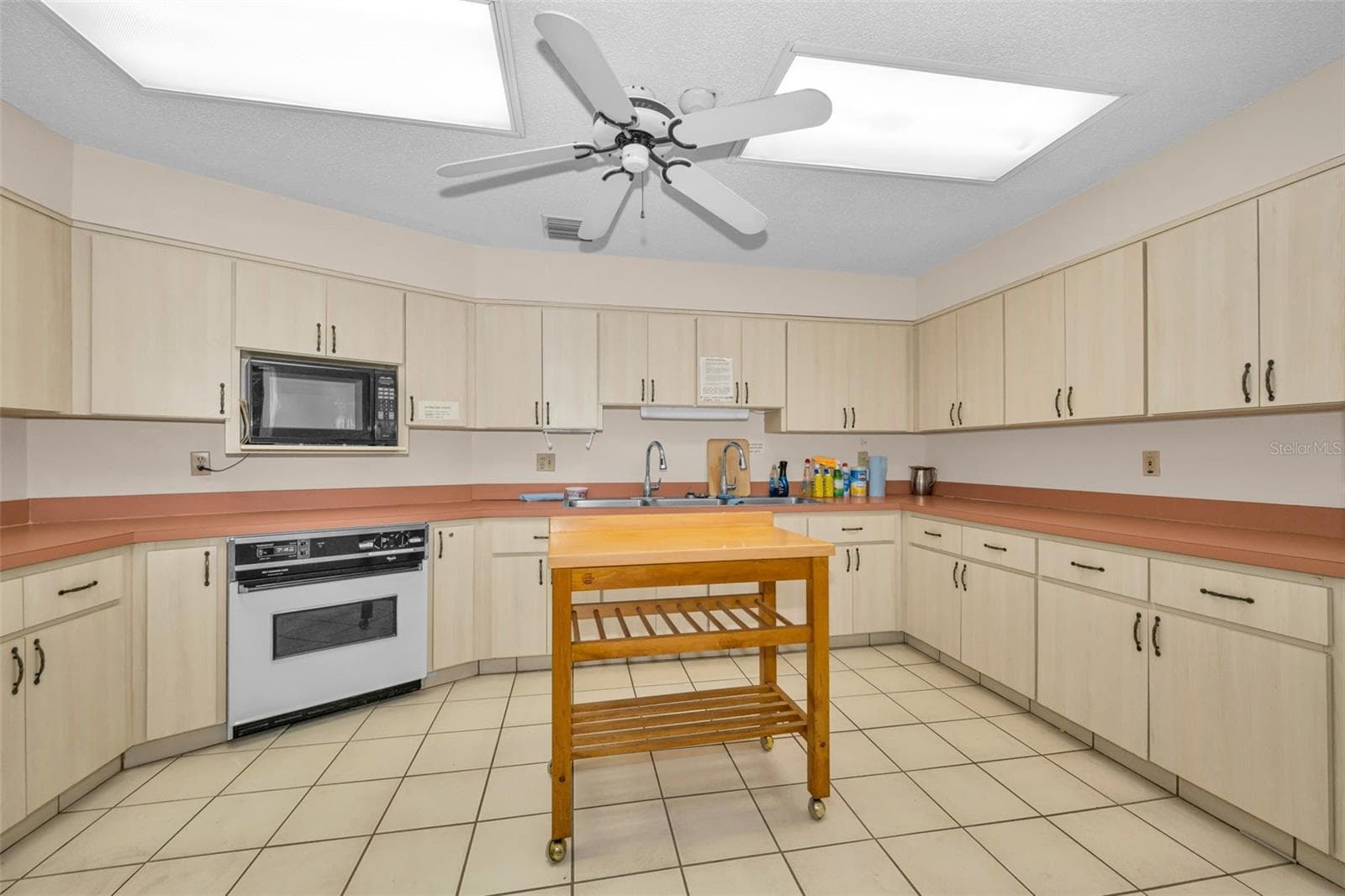 Kitchen in Association Clubhouse used for parties etc. - 5400 PARK ST N #303, ST PETERSBURG