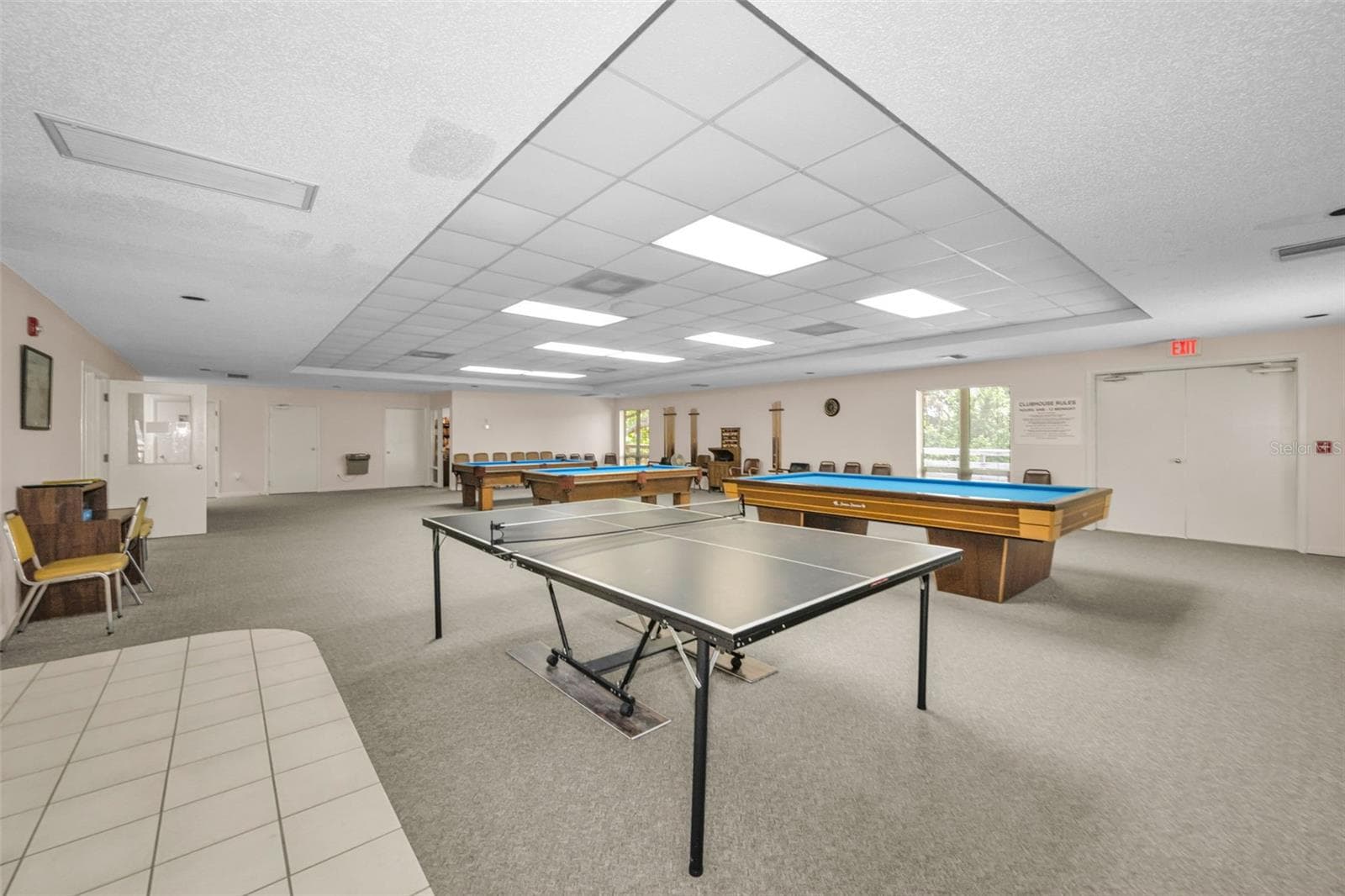 Pingpong table and 3 pool tables in Clubhouse. - 5400 PARK ST N #303, ST PETERSBURG