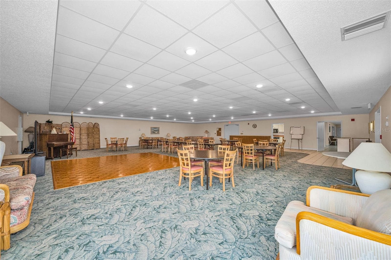 View of dance floor and card tables. - 5400 PARK ST N #303, ST PETERSBURG