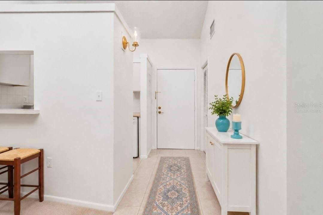 Tiled Foyer(Partially virtually staged - 2415 NE 7TH ST #8, OCALA