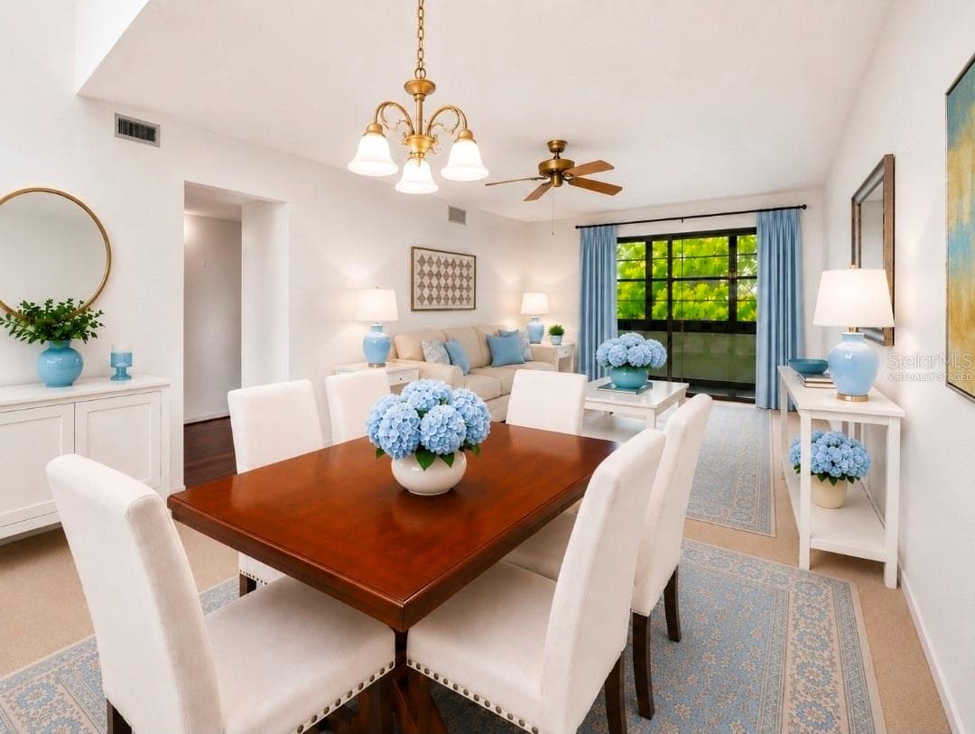 Dining & Living room combo.  Arrange as you need. (Partially virtually staged Sectional couch would fit nicely too - 2415 NE 7TH ST #8, OCALA