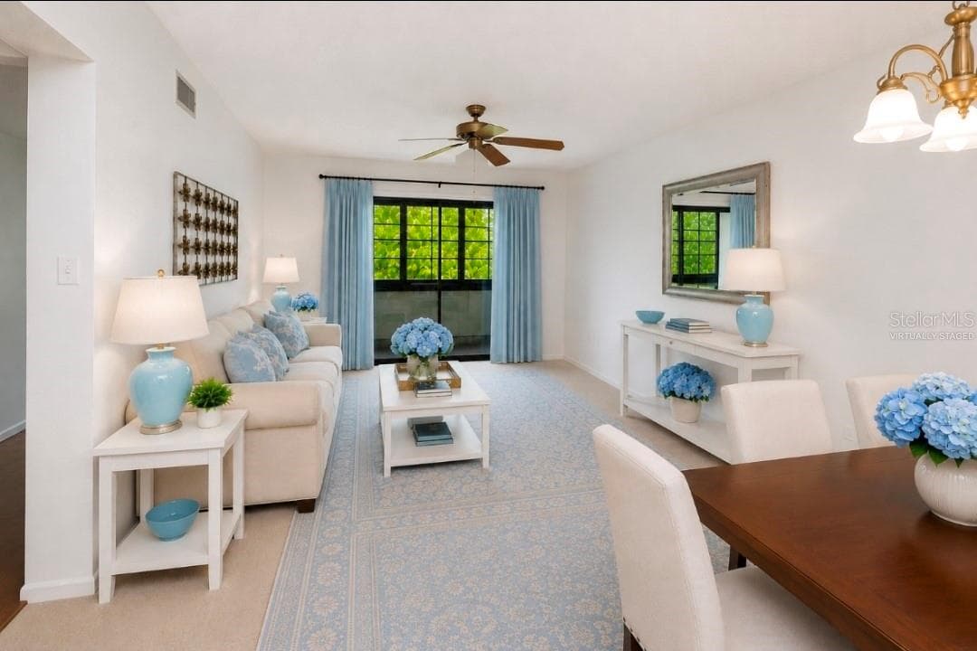 Dining room looking to living room and Lanai(Partially virtually staged - 2415 NE 7TH ST #8, OCALA