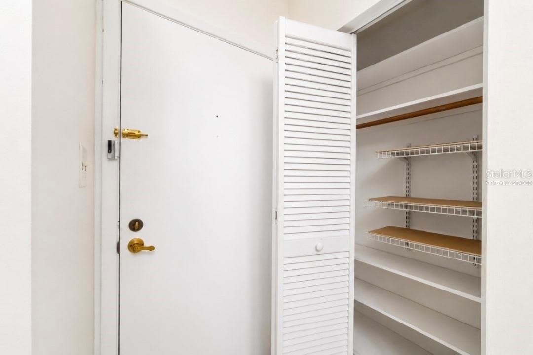 Hall way linen closet - 2415 NE 7TH ST #8, OCALA