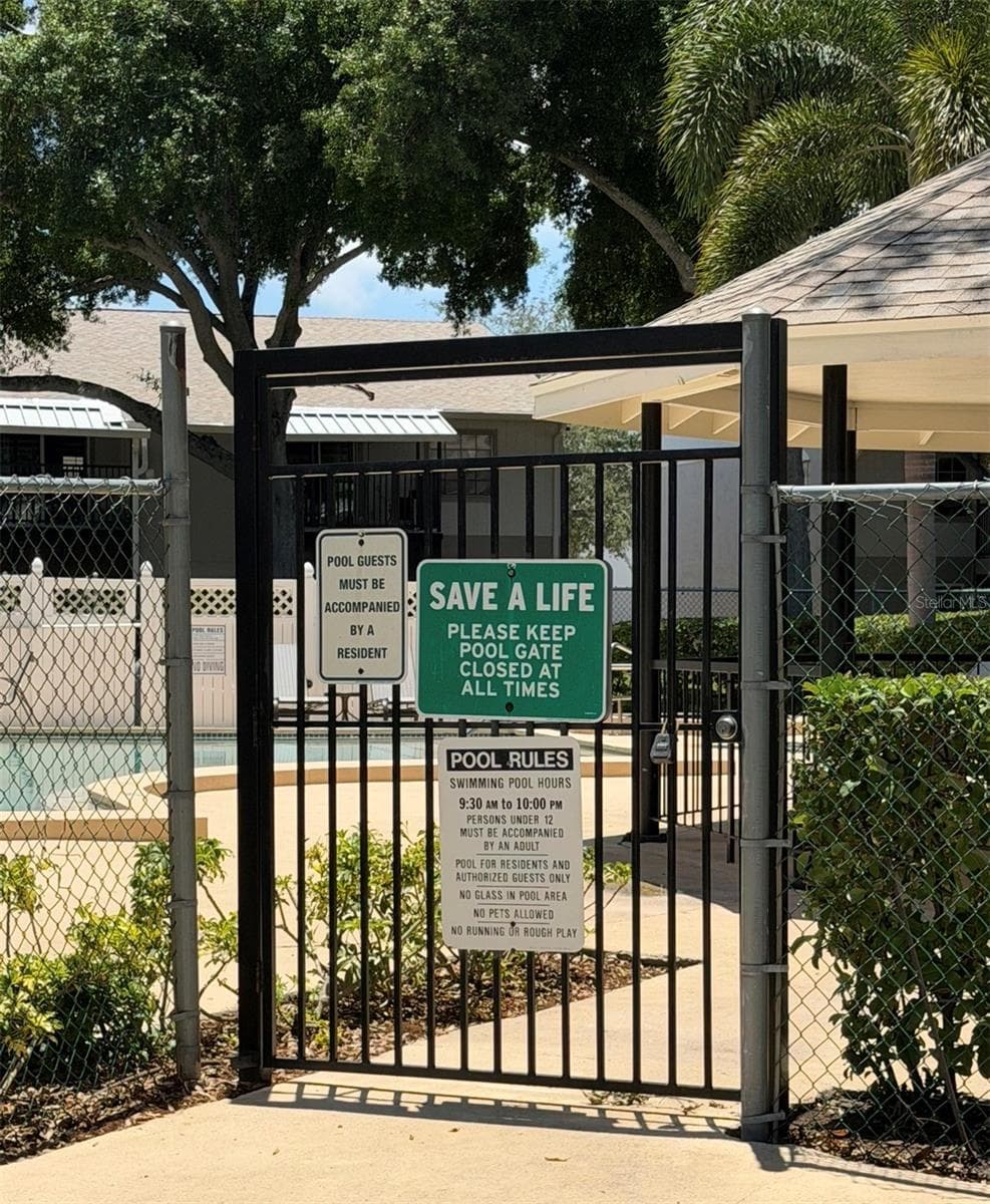 The pool area is gated for your safety. - 3815 N OAK DR #G71, TAMPA