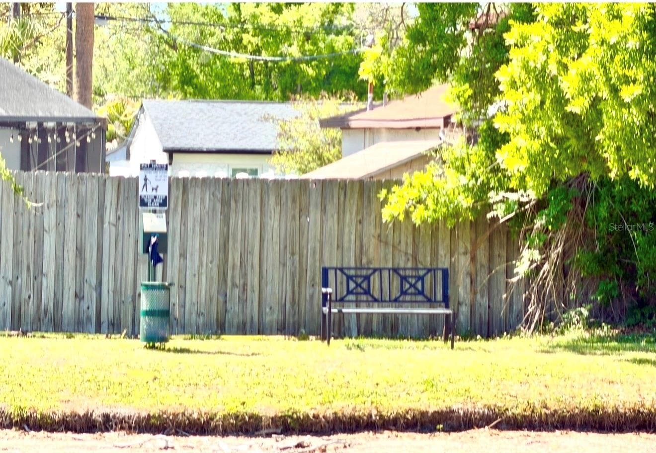You can walk around the lake, and there's a bench and a pet clean-up station on the other side. - 3815 N OAK DR #G71, TAMPA