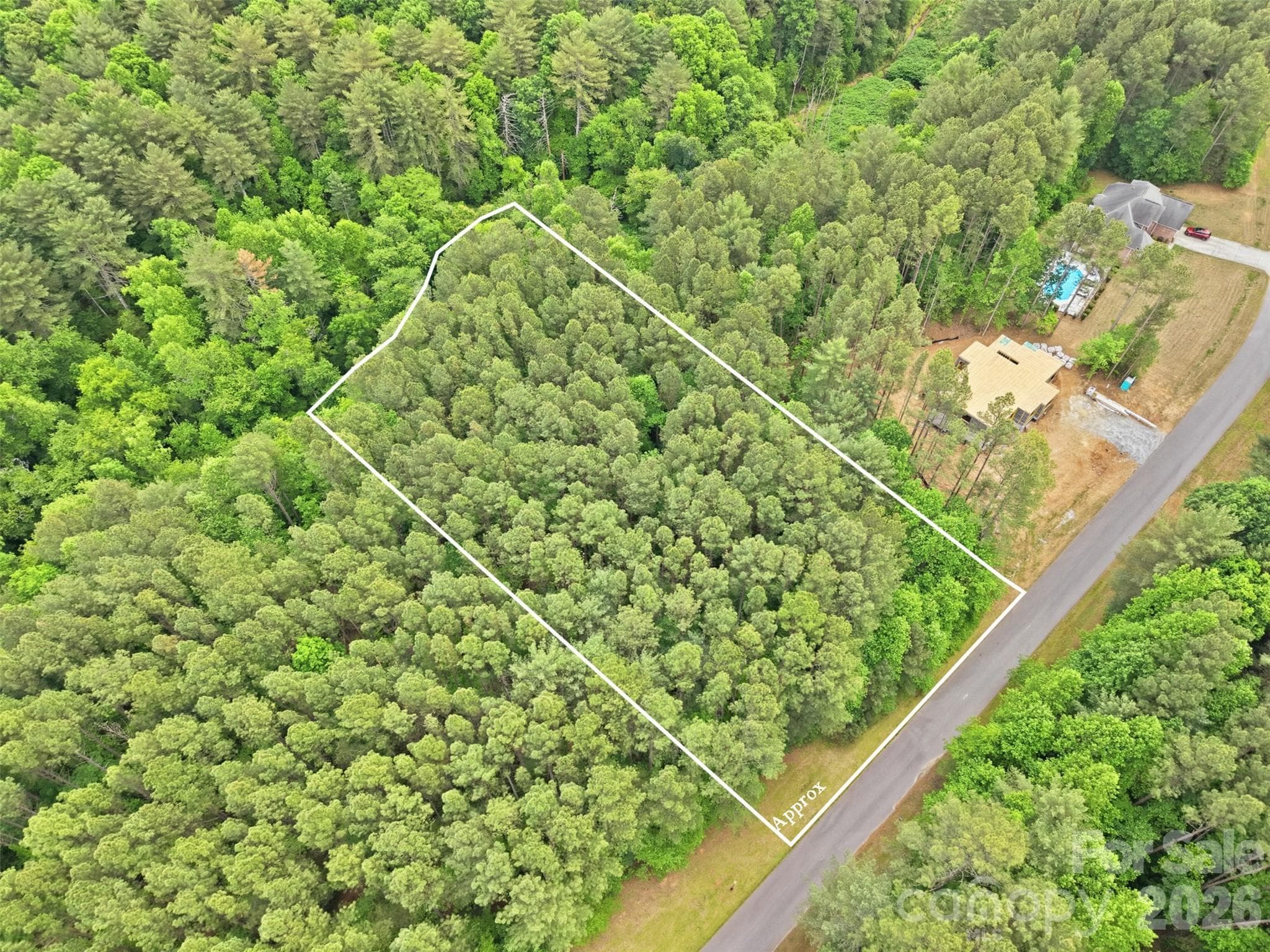 Wooded privacy stretches in every direction - 6020 Plantation Pointe Drive, Granite Falls