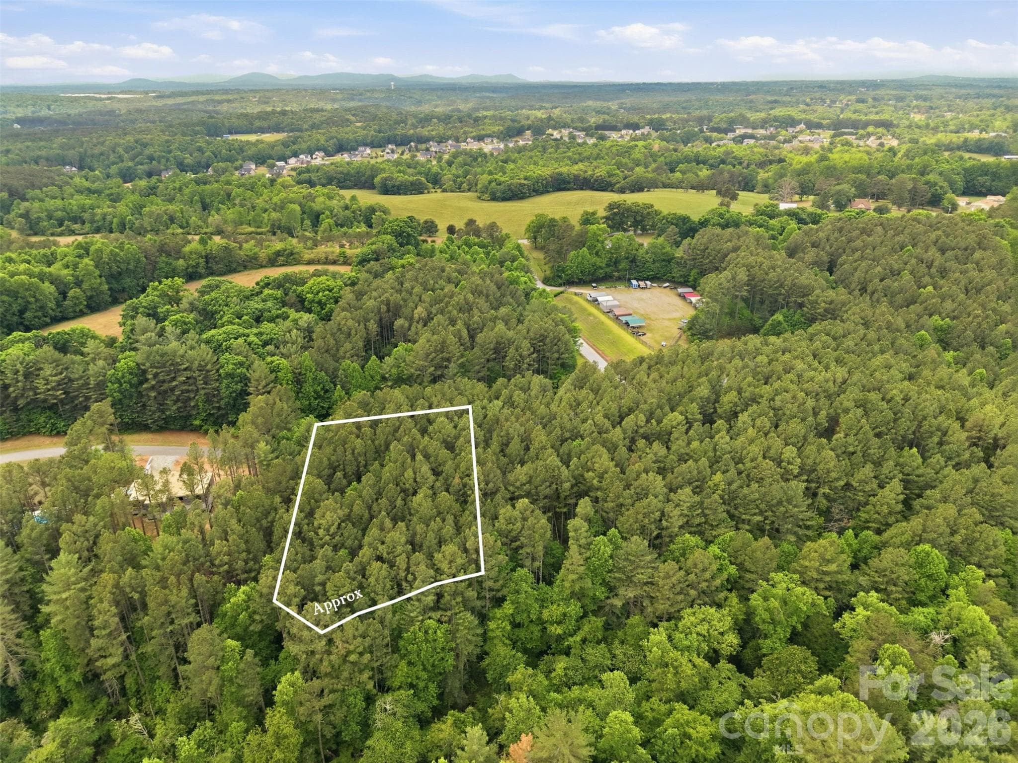 Rolling Blue Ridge foothills frame the community - 6020 Plantation Pointe Drive, Granite Falls