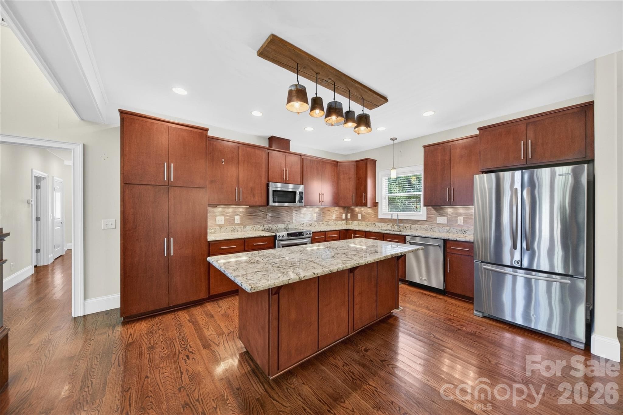 Cabinets feature pull out deep shelves for easy access - 2977 Cabin Creek Drive, Catawba