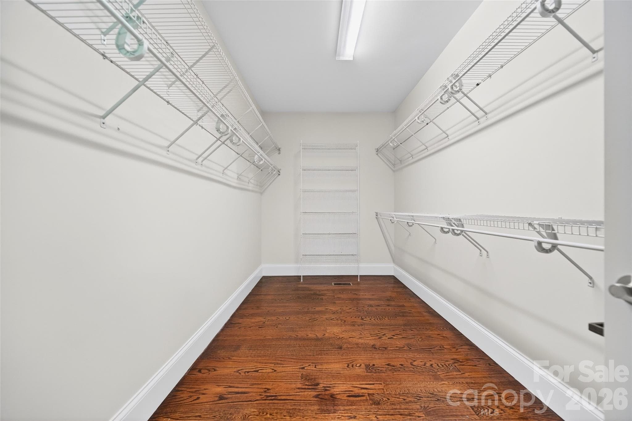 Huge walk-in closet for your Primary bedroom with wood floors - 2977 Cabin Creek Drive, Catawba