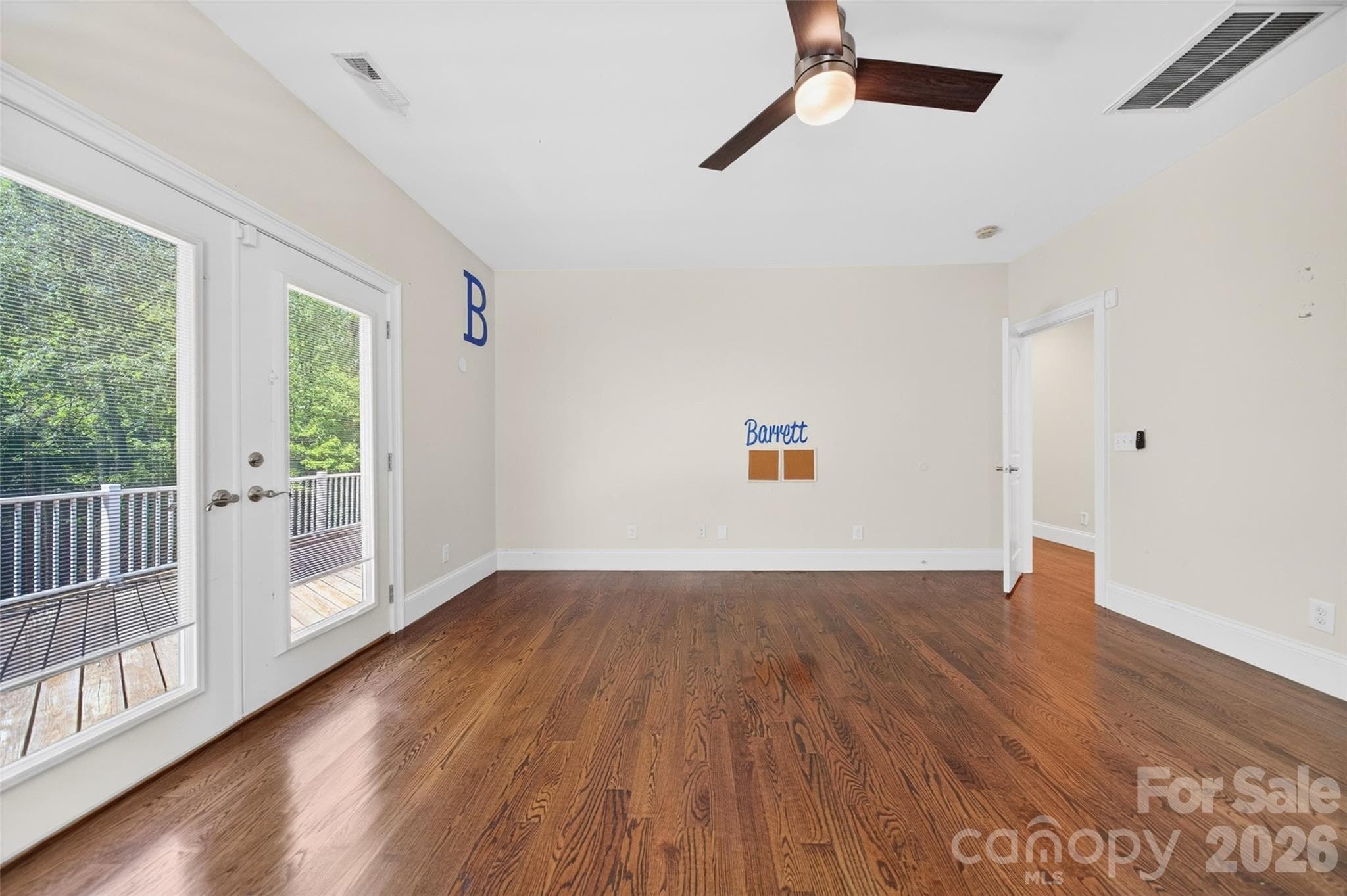 Bedroom 3 has french door access to the rear deck - 2977 Cabin Creek Drive, Catawba
