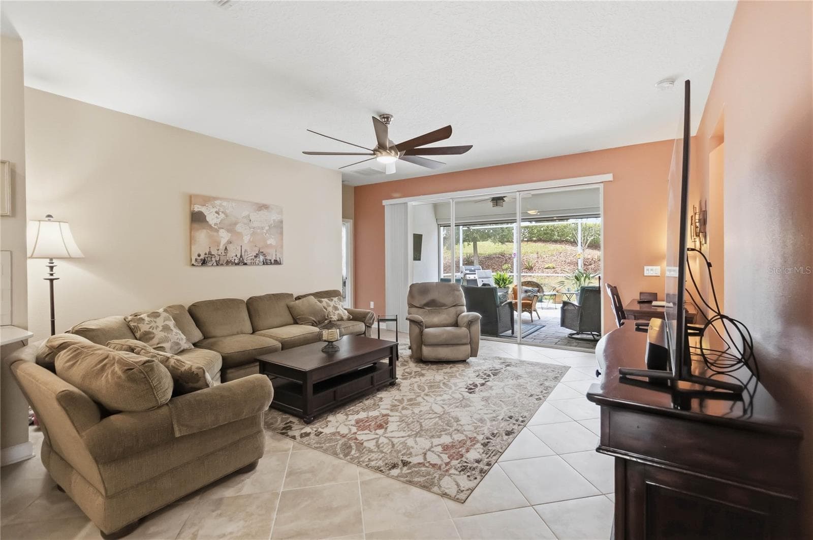 Family room opens to large lanai - 1361 OLYMPIC CLUB BLVD, CHAMPIONS GATE