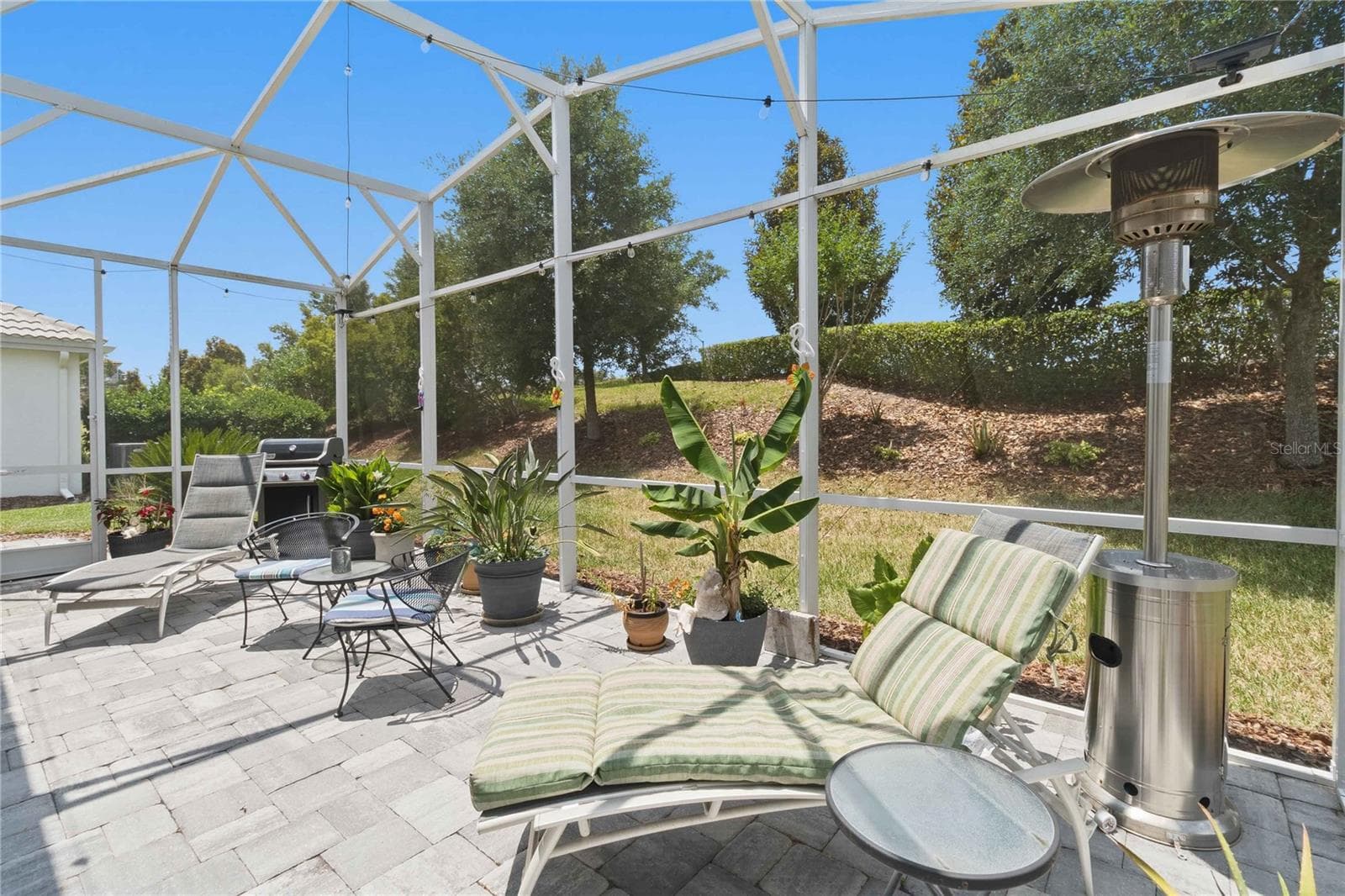 serene back yard with no rear neighbors - 1361 OLYMPIC CLUB BLVD, CHAMPIONS GATE
