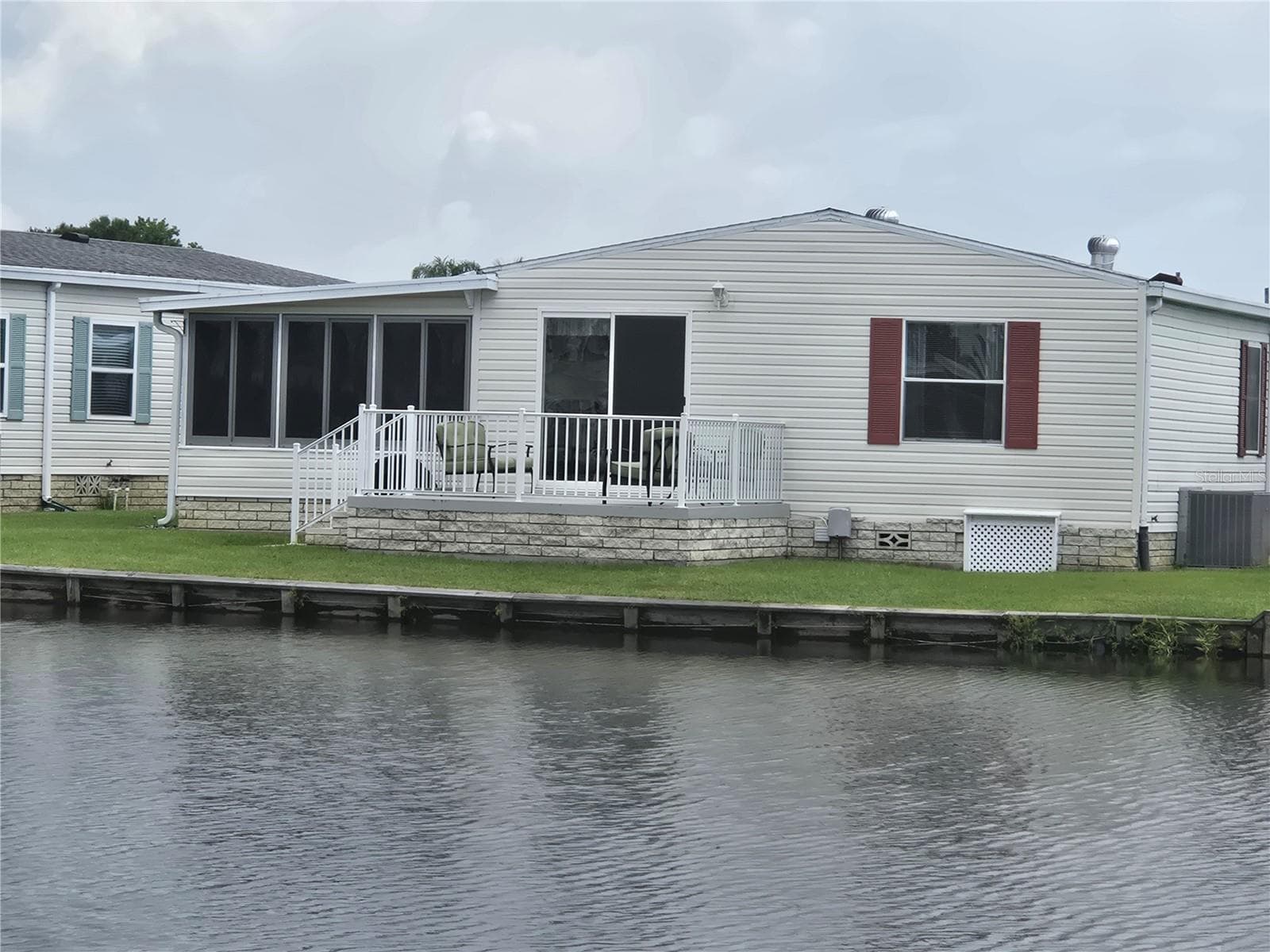Manufactured Home at 88 STRAPHMORE DR, HAINES CITY, photo 3 of 93