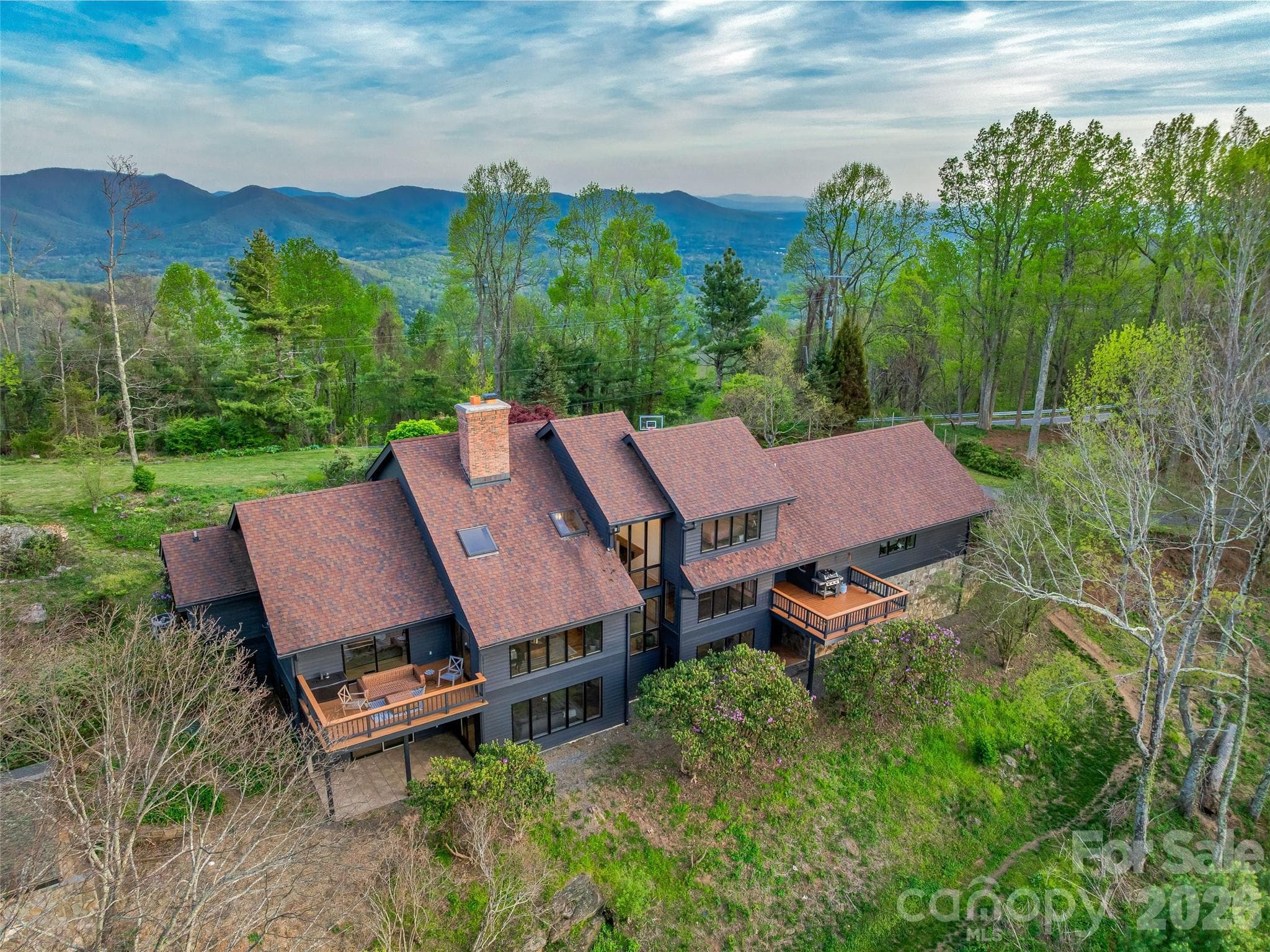 The house also offers southeast views of the beautiful Haw Creek valley. - 100 Big Spring Drive, Asheville