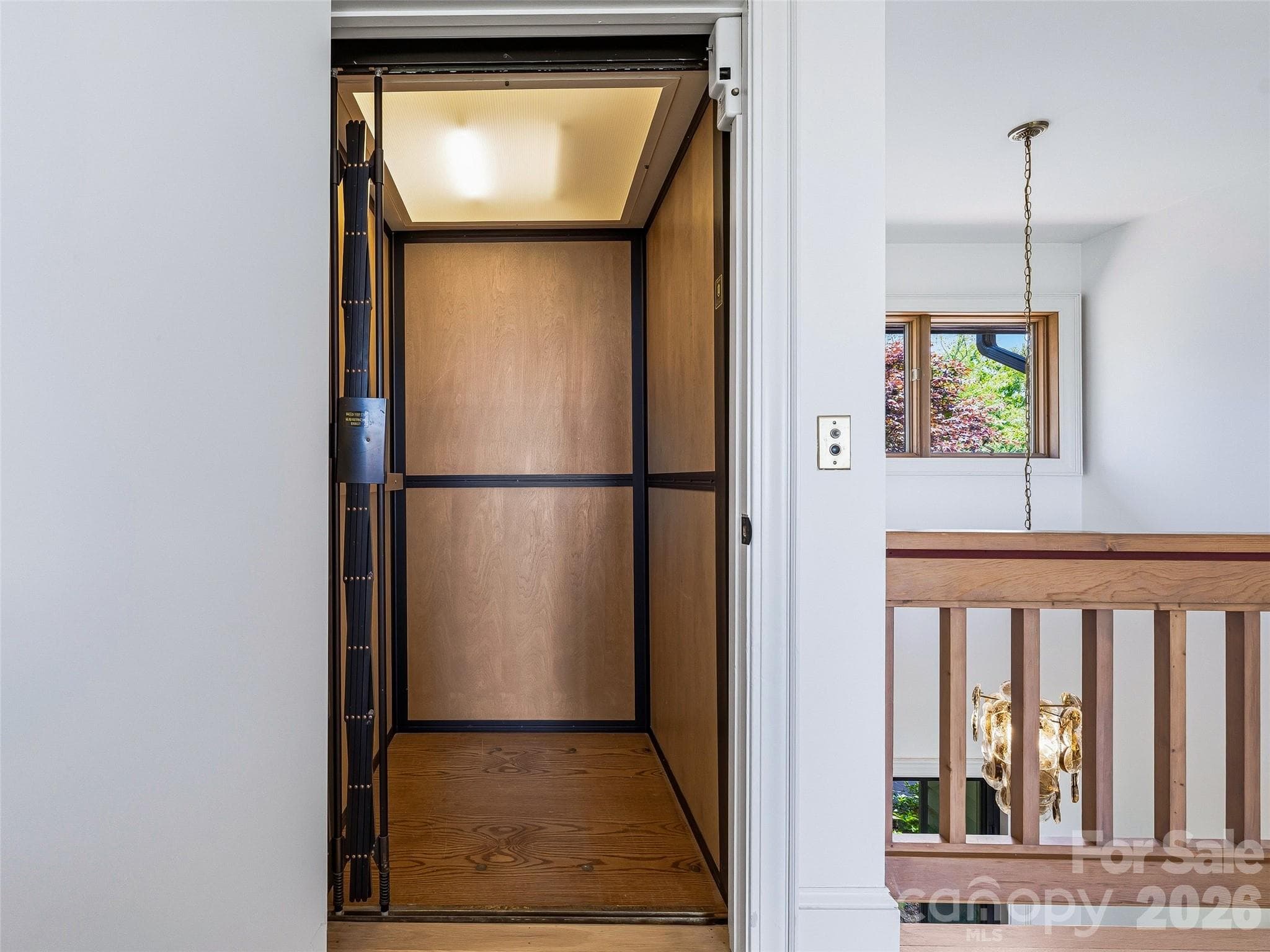 The Elevette elevator is located just off of the foyer and offers access to every level. - 100 Big Spring Drive, Asheville